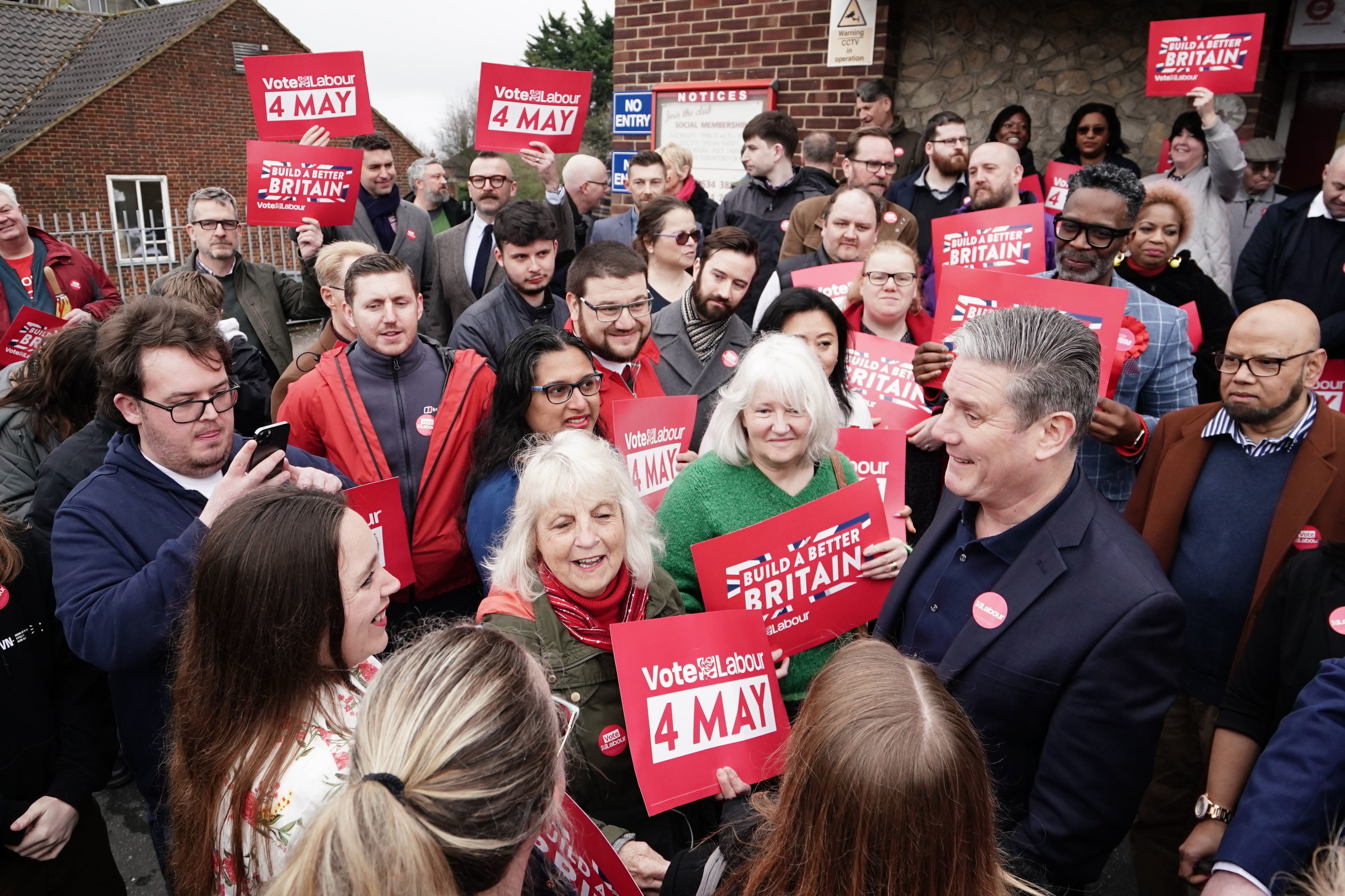 Labour Party leader Sir Keir Starmer with supporters outside the Gillingham Labour Club during campaigning in Gillingham for the local elections in May