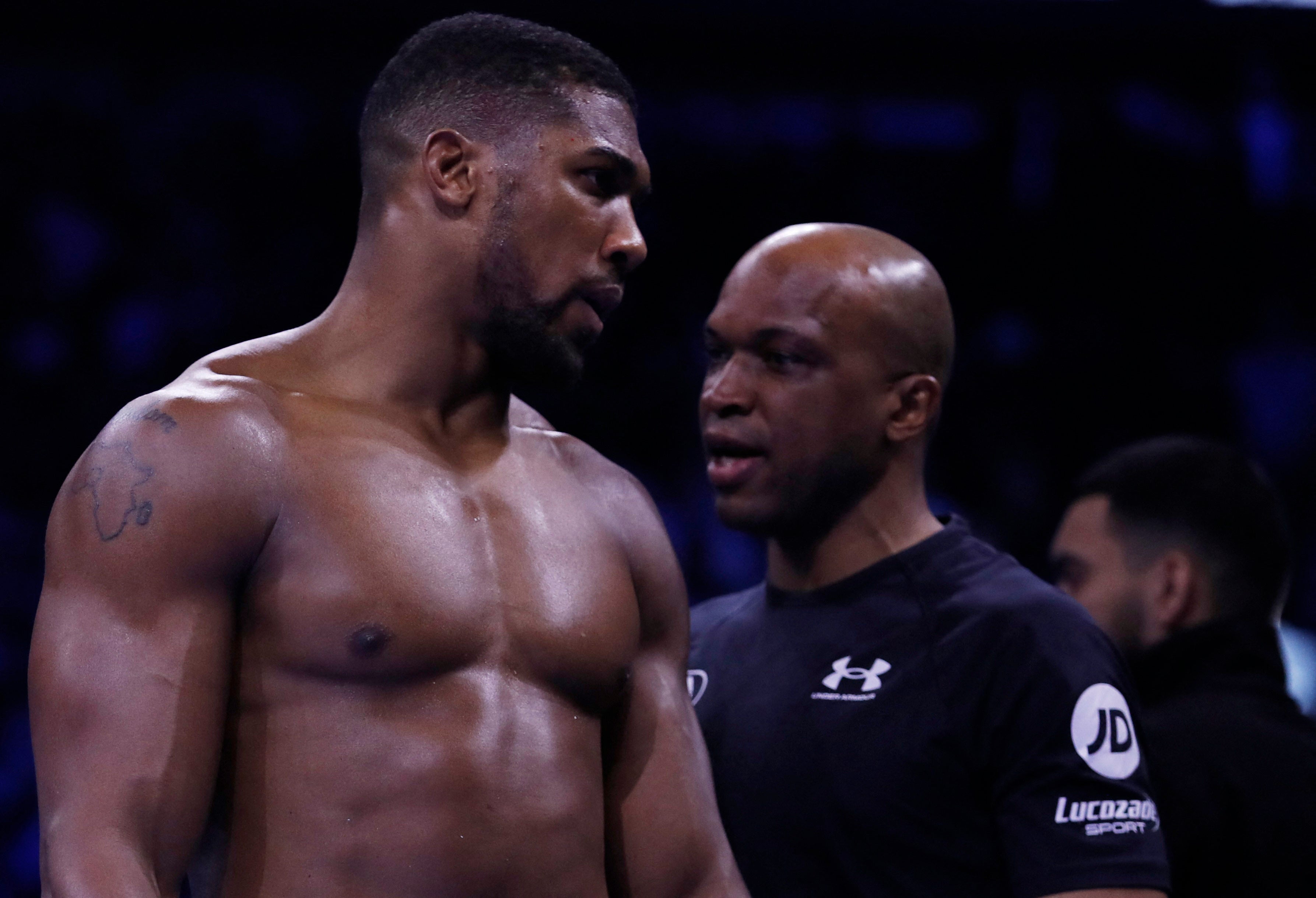 James (right) with Anthony Joshua