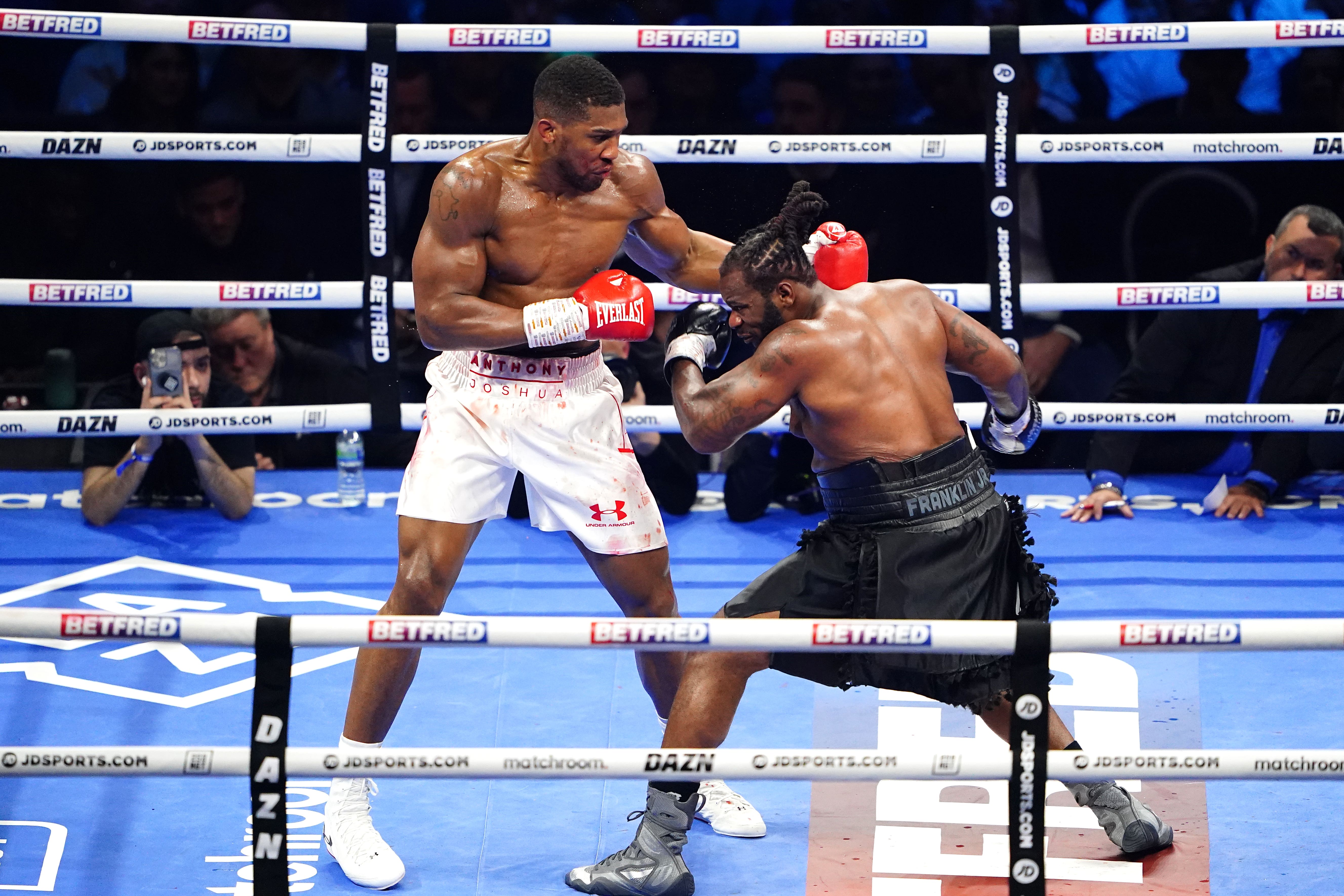 Anthony Joshua (left) laboured to victory over Jermaine Franklin (Zac Goodwin/PA).