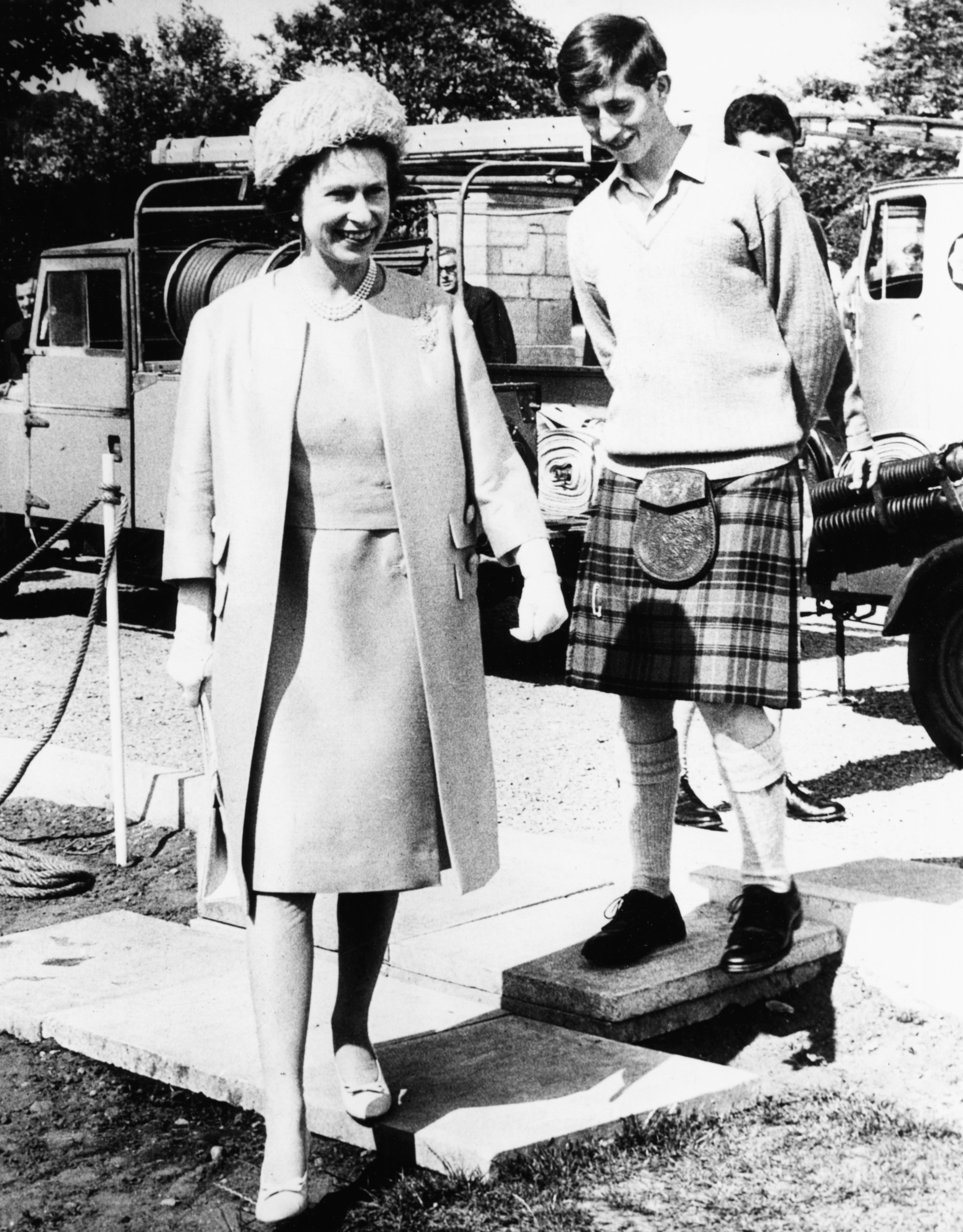 Queen Elizabeth II and Prince Charles, who was Head Boy here, pictured during a visit to Gordonstoun School, where she opened their new Sports Centre, Scotland, July 24th 1967