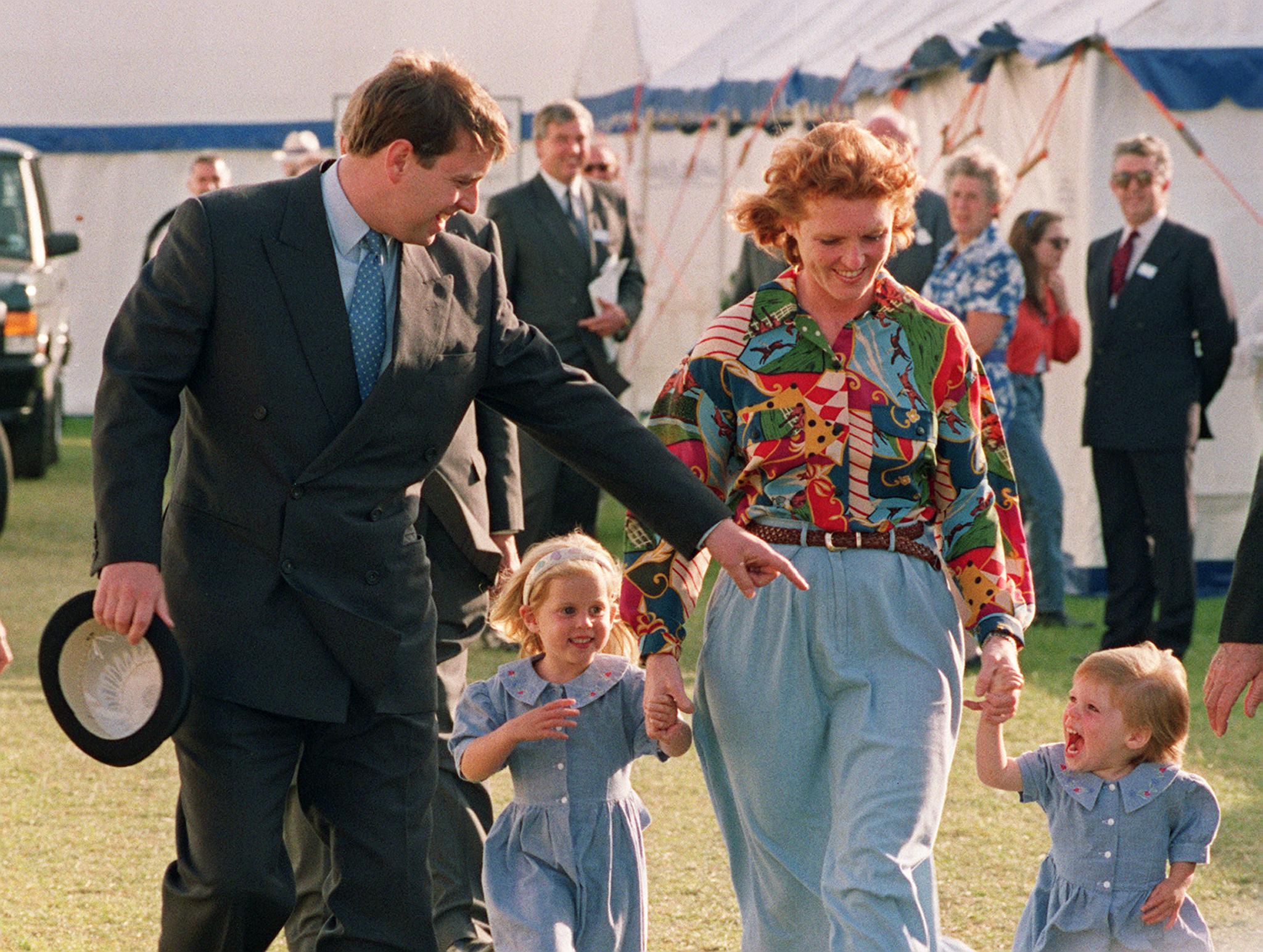 Sarah Ferguson with Prince Andrew and their children, Eugenie and Beatrice, in 1992, on their first public outing since announcing their separation