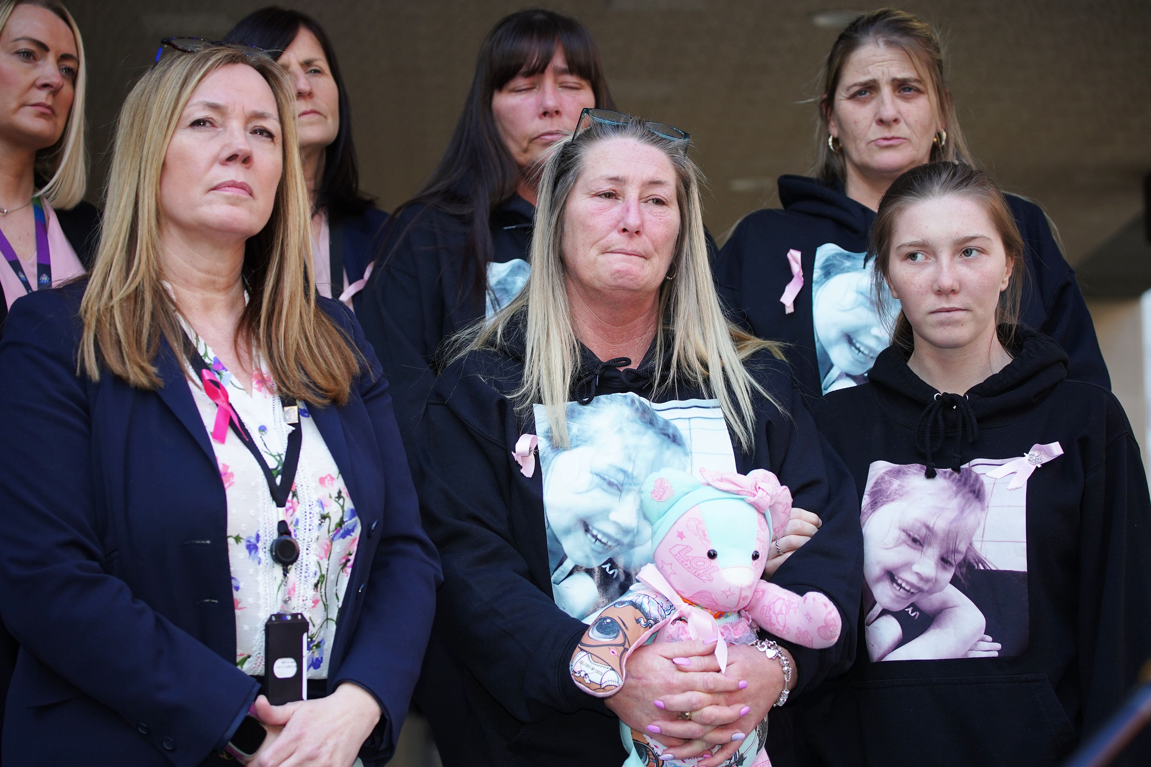 Cheryl Korbel (centre) outside Manchester Crown Court after Thomas Cashman was sentenced