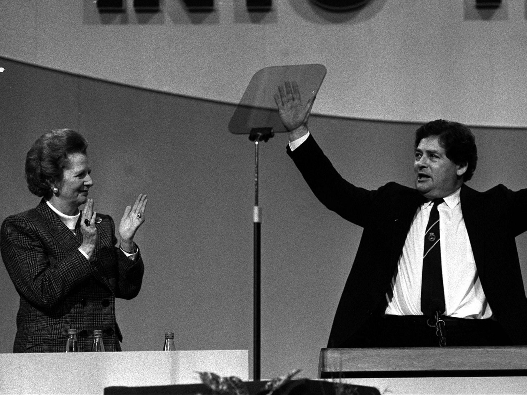 Margaret Thatcher applauds her chancellor, Nigel Lawson, at the Conservative Party conference in 1988