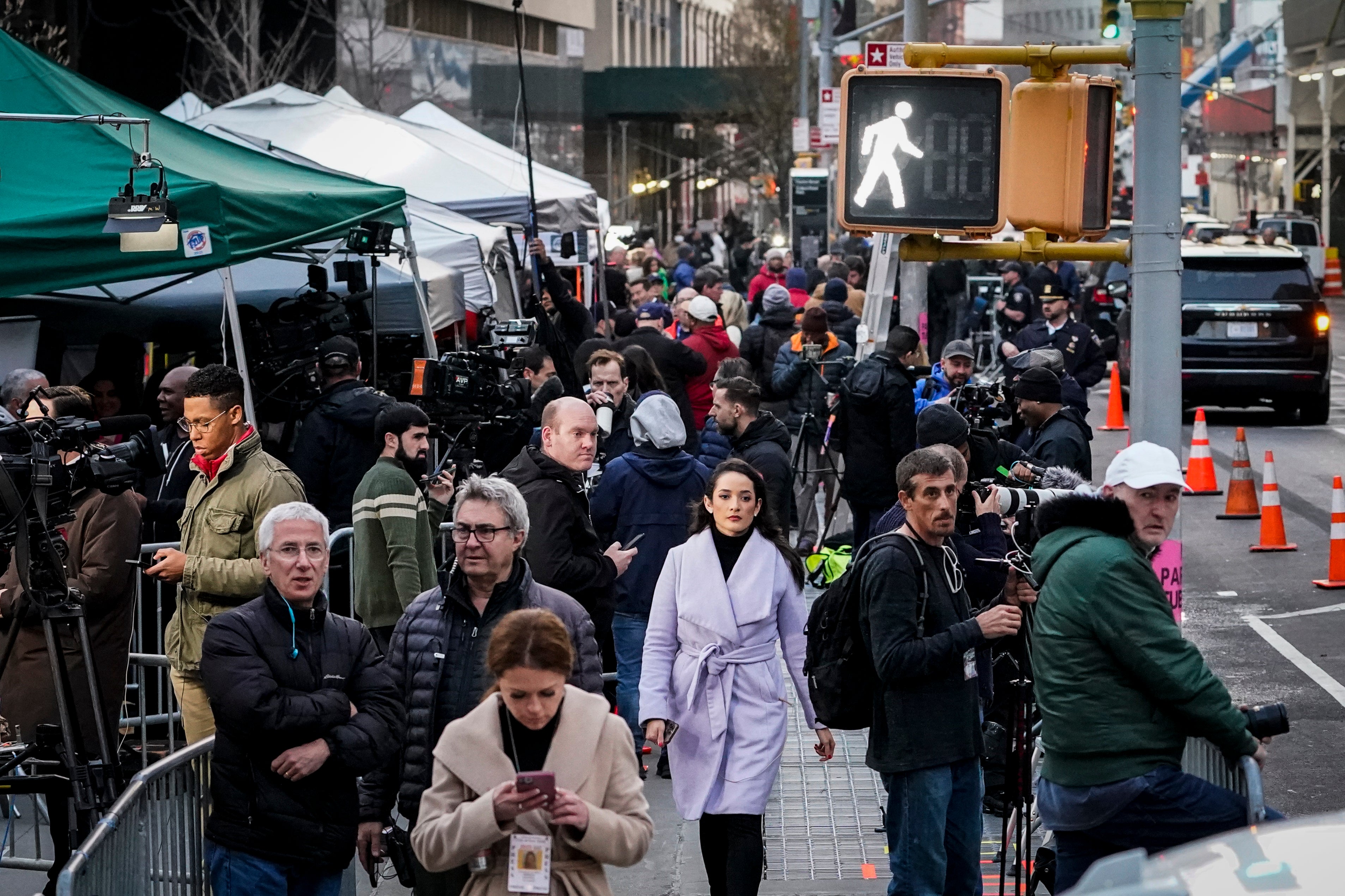 Journalists gather across the street from Manhattan Criminal Court, Tuesday, April 4 2023