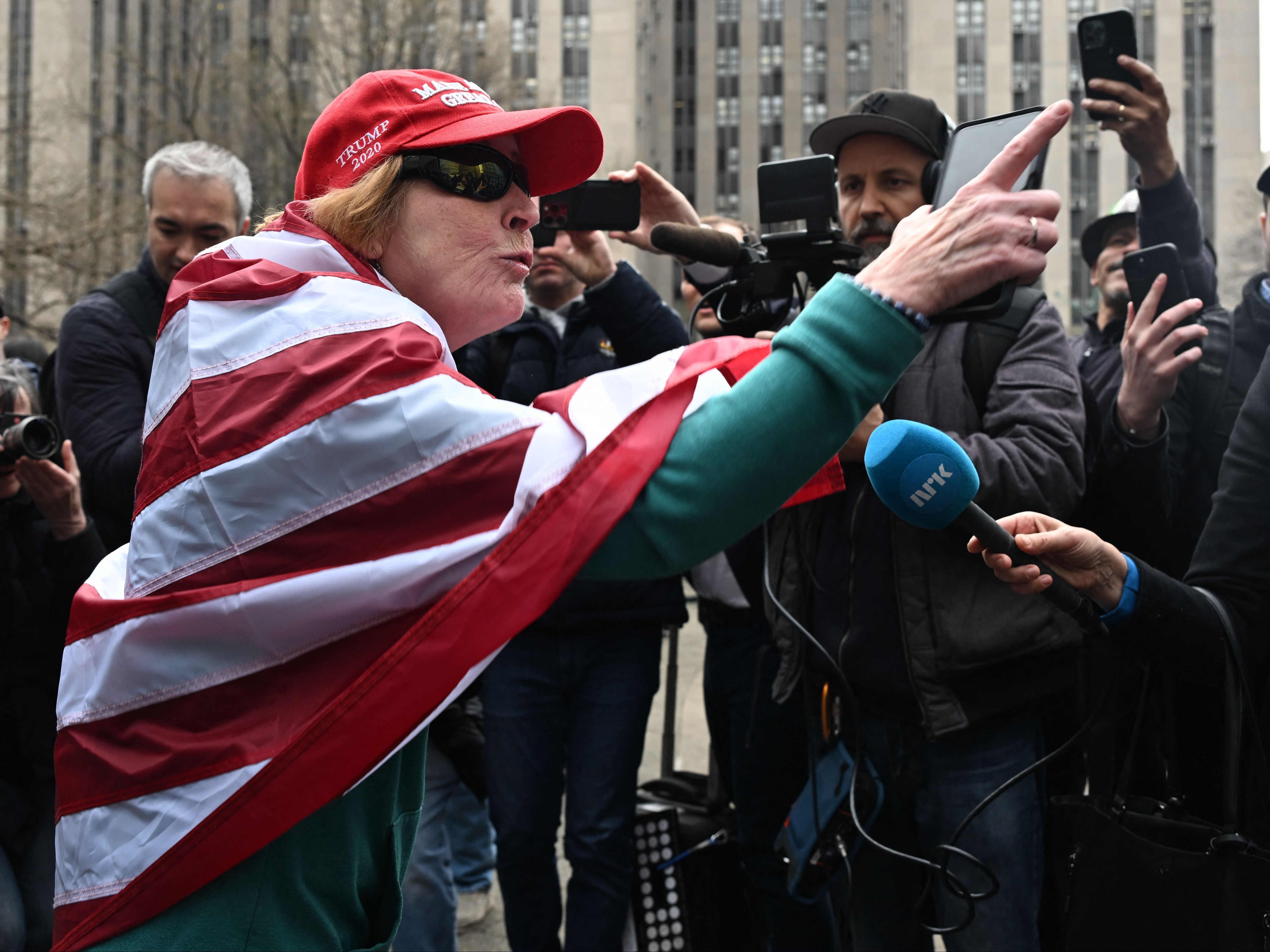Chaos outside Trump court as clashes erupt between MAGA fans and foes
