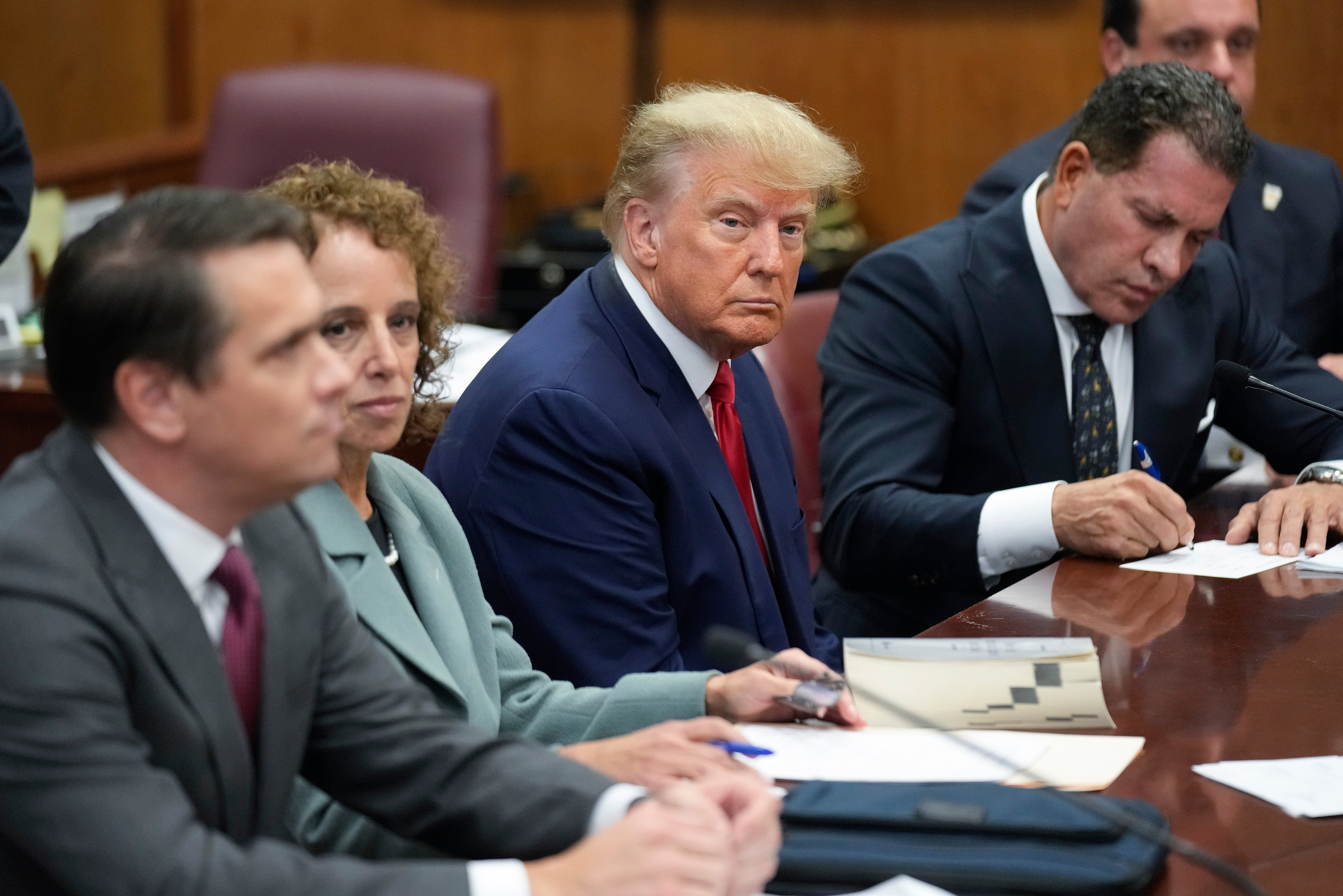 Trump in court at his arraignment on Tuesday 4 April