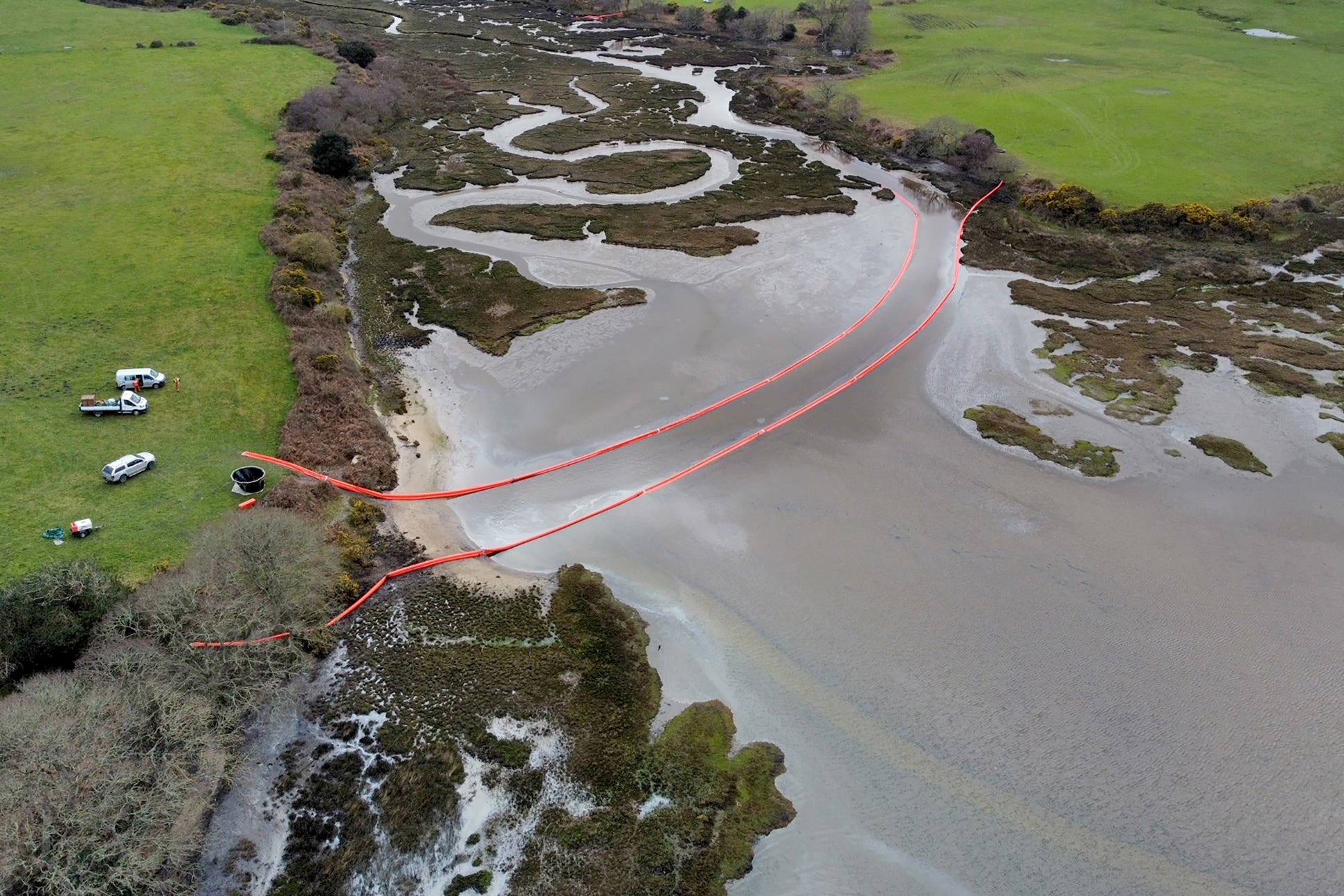 Oil in Poole Harbour after a leak from a pipeline at an onshore oil field (Ben Birchall/PA)