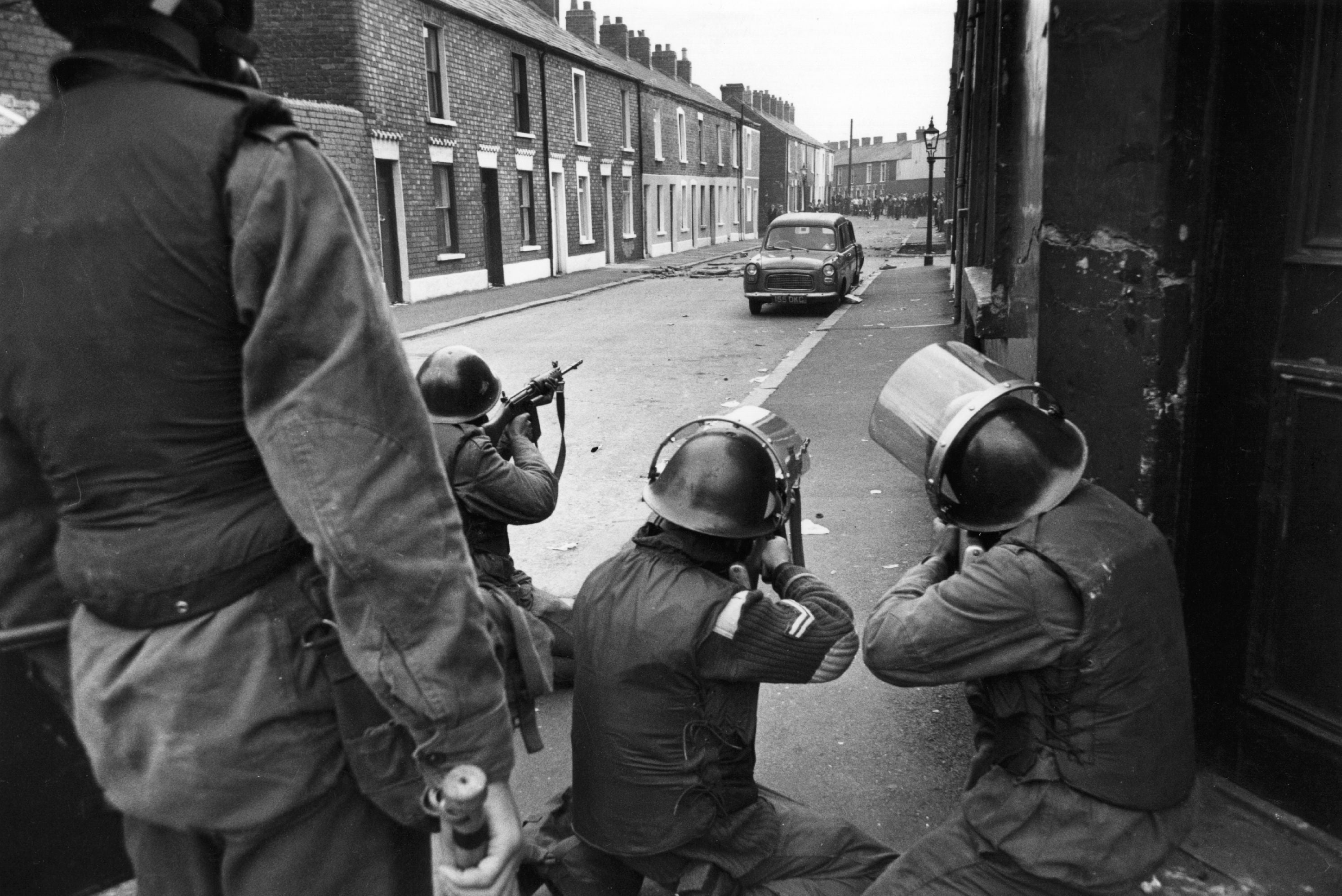 British soldiers take aim at civil-rights demonstrators in the Falls Road, Belfast