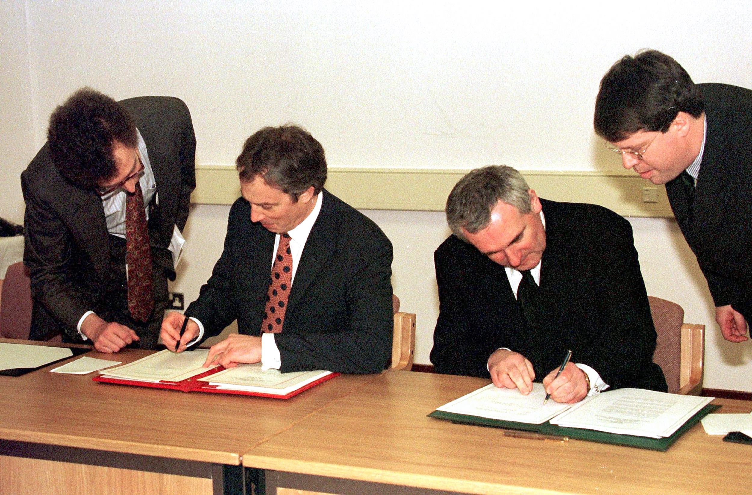 Tony Blair and Bertie Ahern sign the Good Friday Agreement