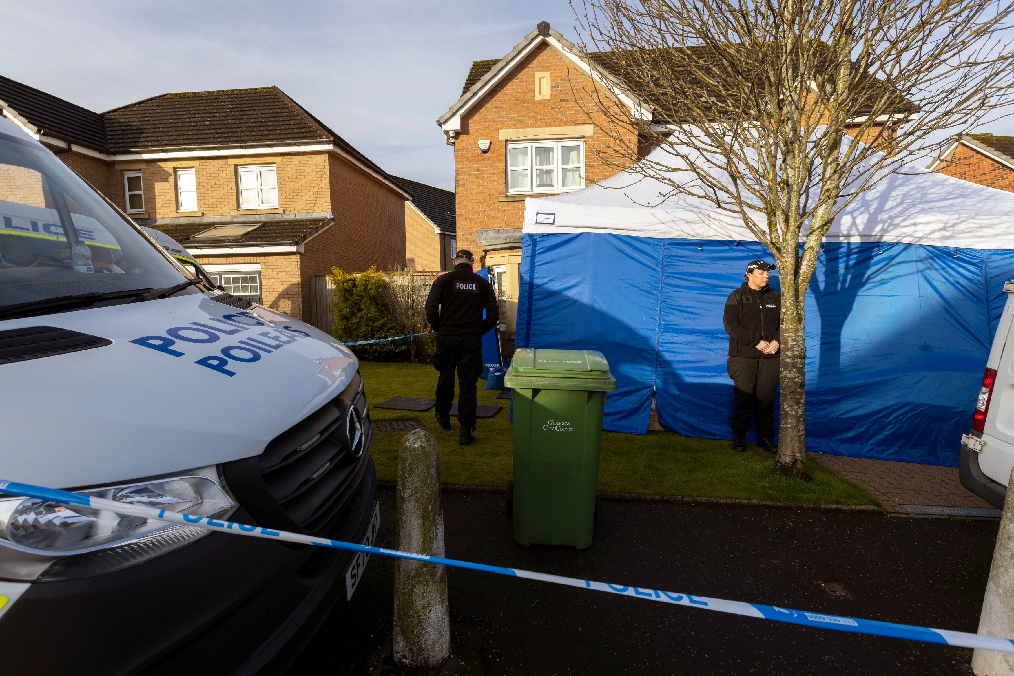 A tent remains outside the property as the investigation continues