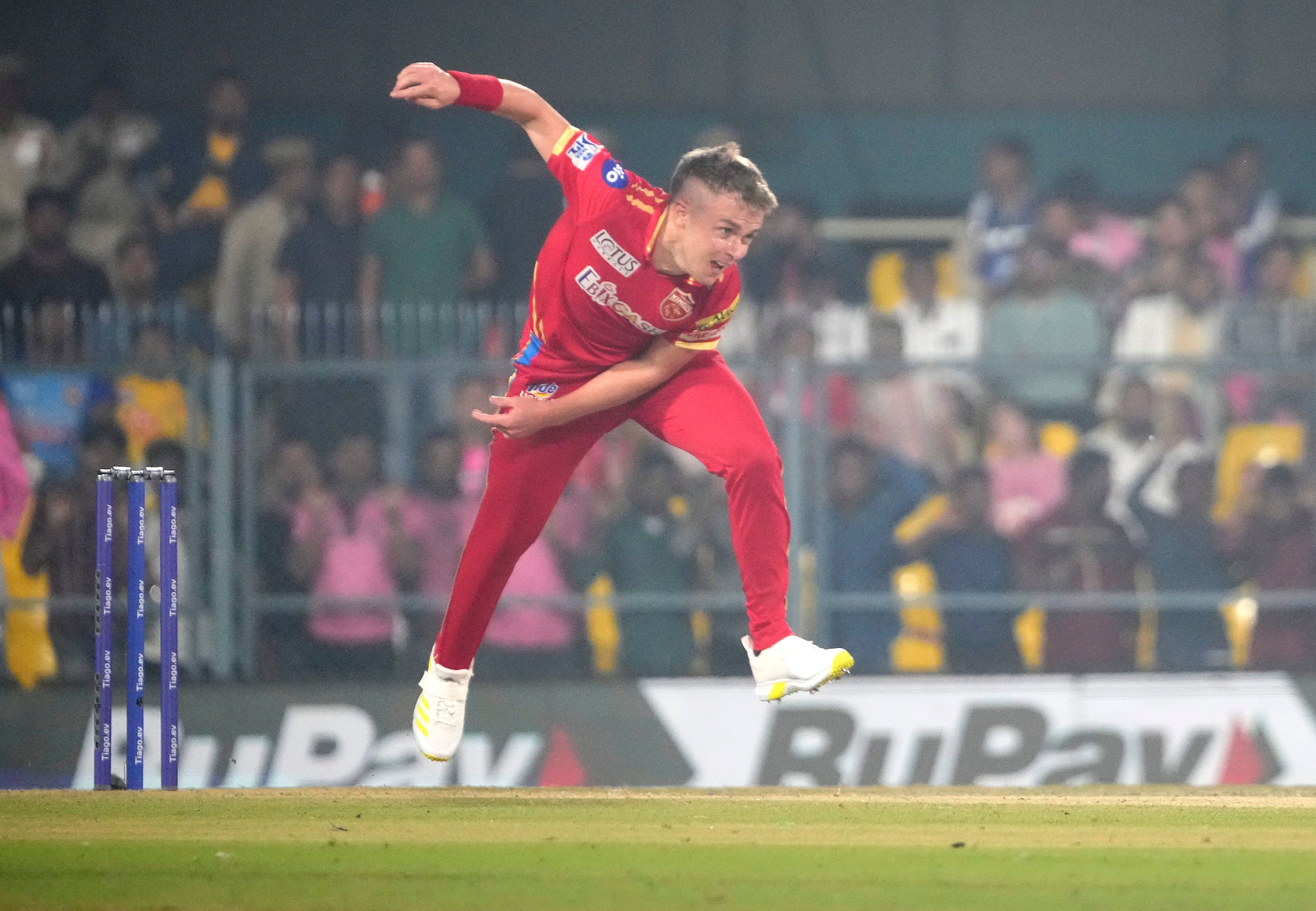 Punjab Kings' Sam Curran bowls a delivery