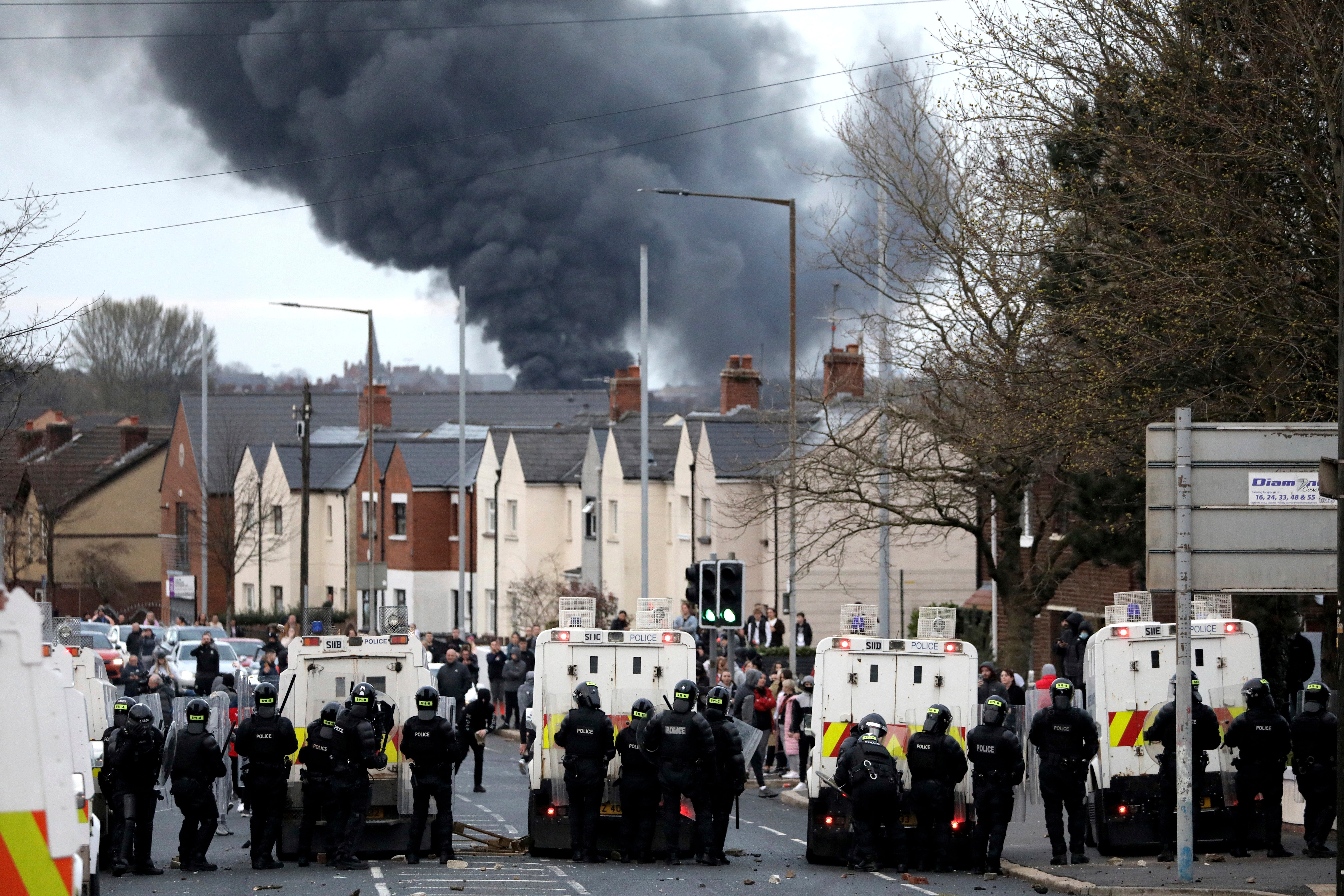 Police attempt to stop nationalists and loyalists attacking each other two years ago on 7 April 2021