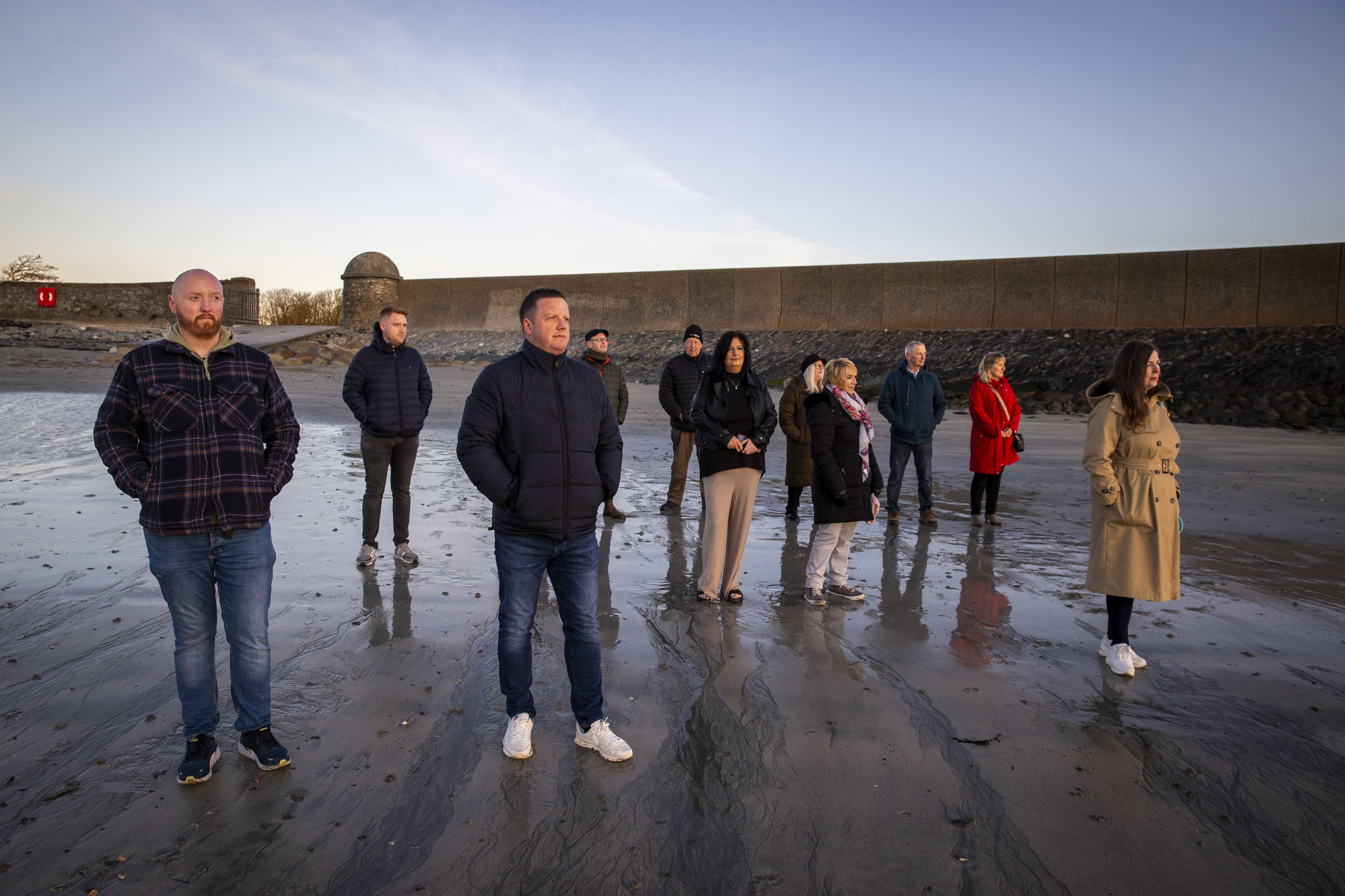 Victims and survivors of the Troubles gather in Killough, Downpatrick, Co Down, to watch the sun rise to mark the 25th anniversary of the Good Friday Agreement (Liam McBurney/PA)