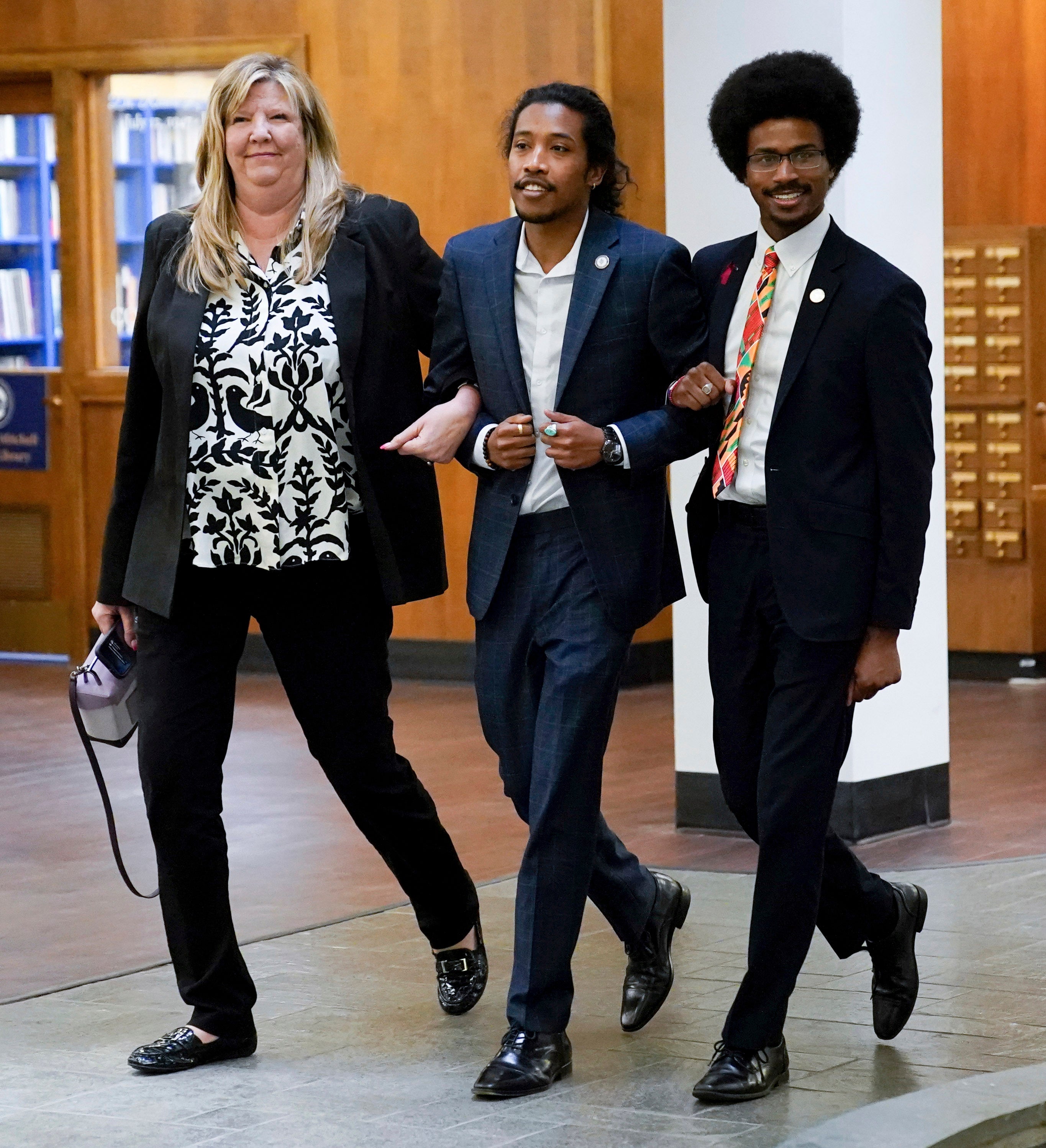 Gloria Johnson, D-Knoxville, left, Justin Jones, center, and Justin Pearson arrive at Fisk University