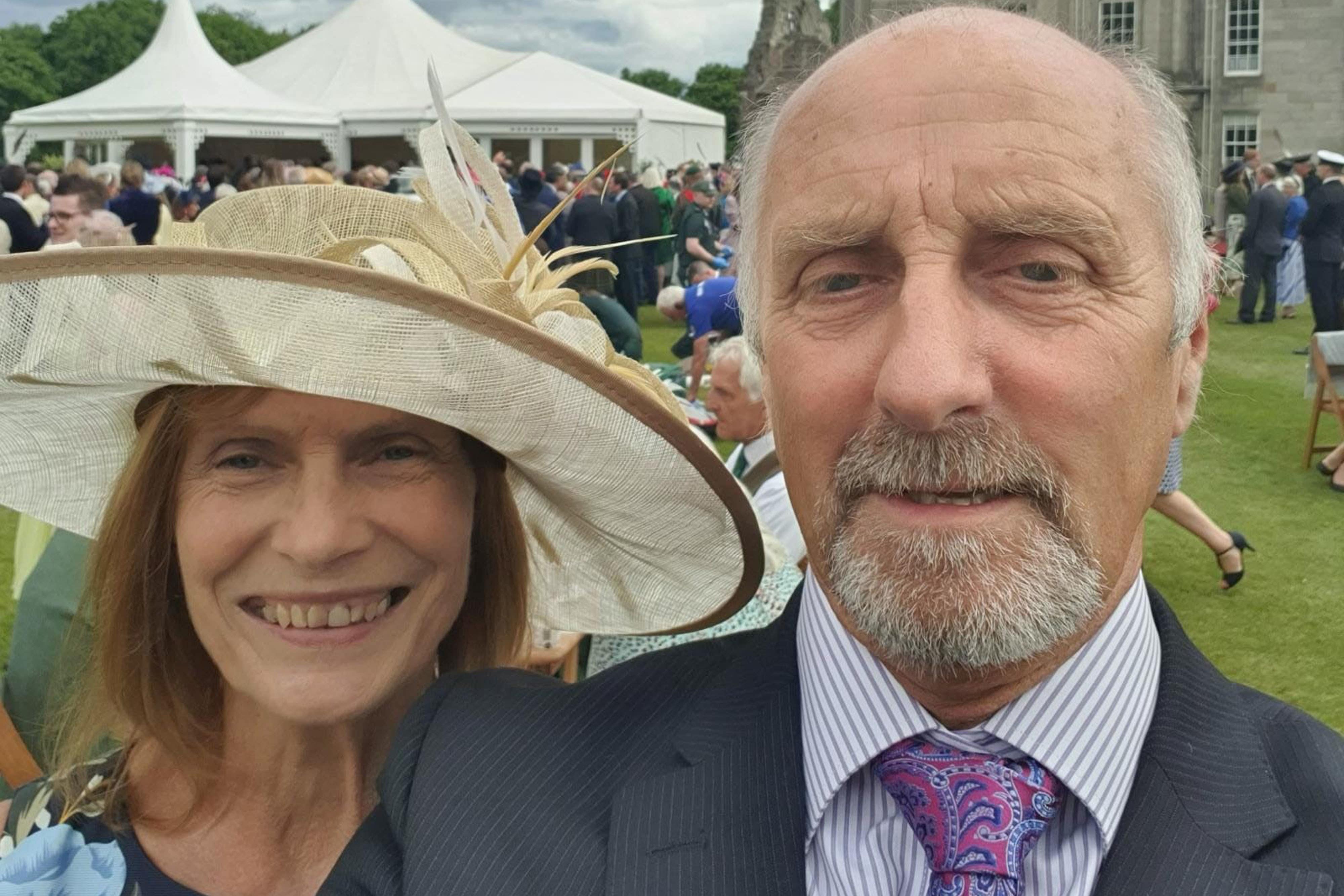 John Anderson and his wife Margaret at a garden party at Holyrood Palace (John Anderson/PA)