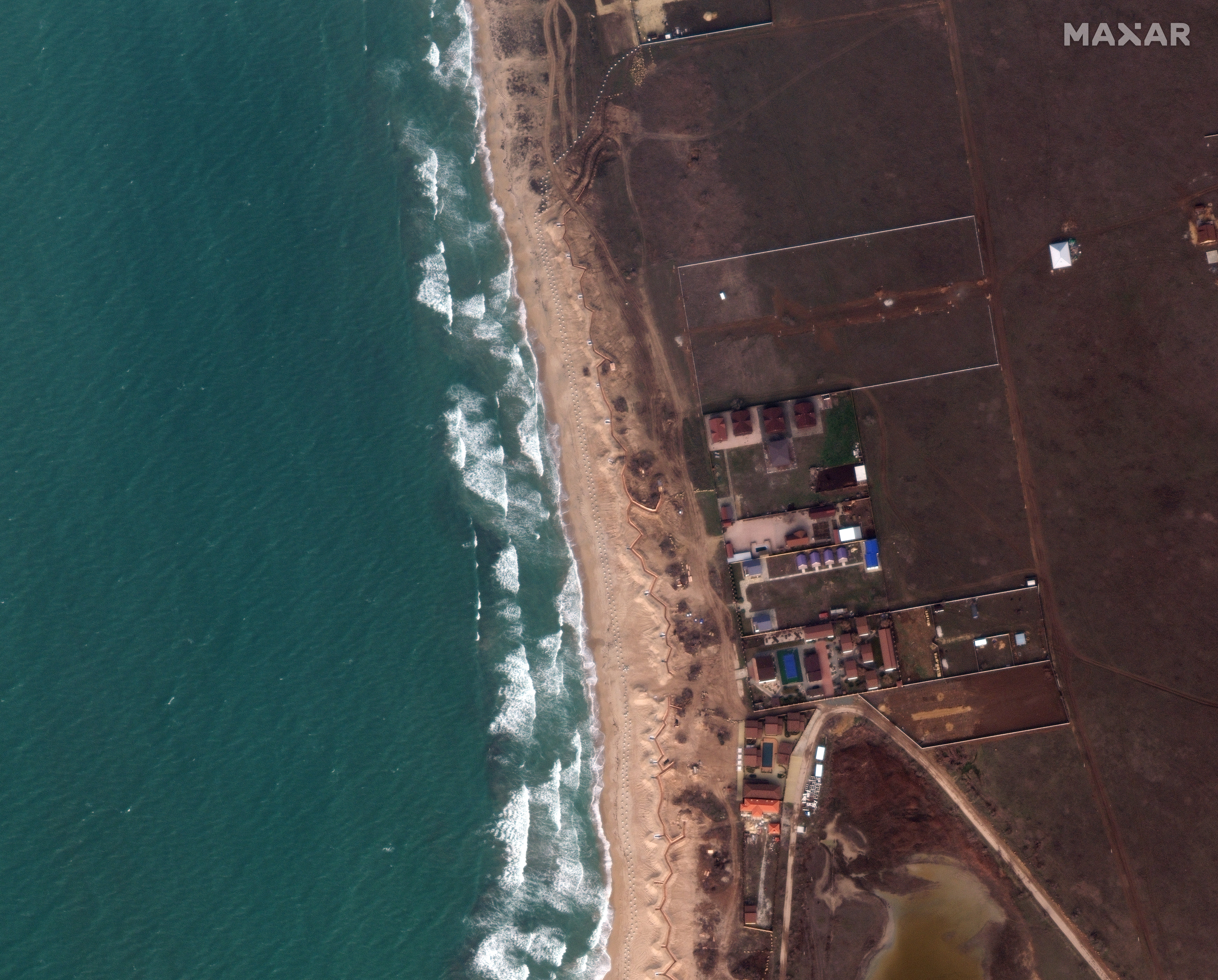 Black Sea coastline dotted with dragons teeth and trenches along a beach west of Yevpatoria in Crimea on 12 March