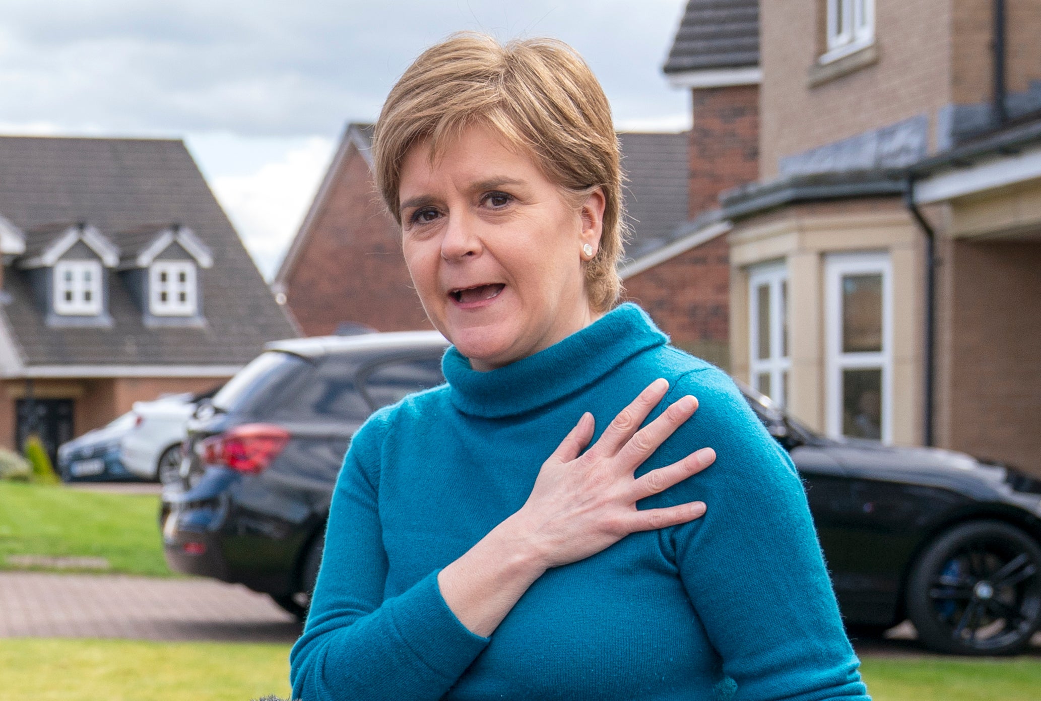 Nicola Sturgeon speaking to reporters outside her home