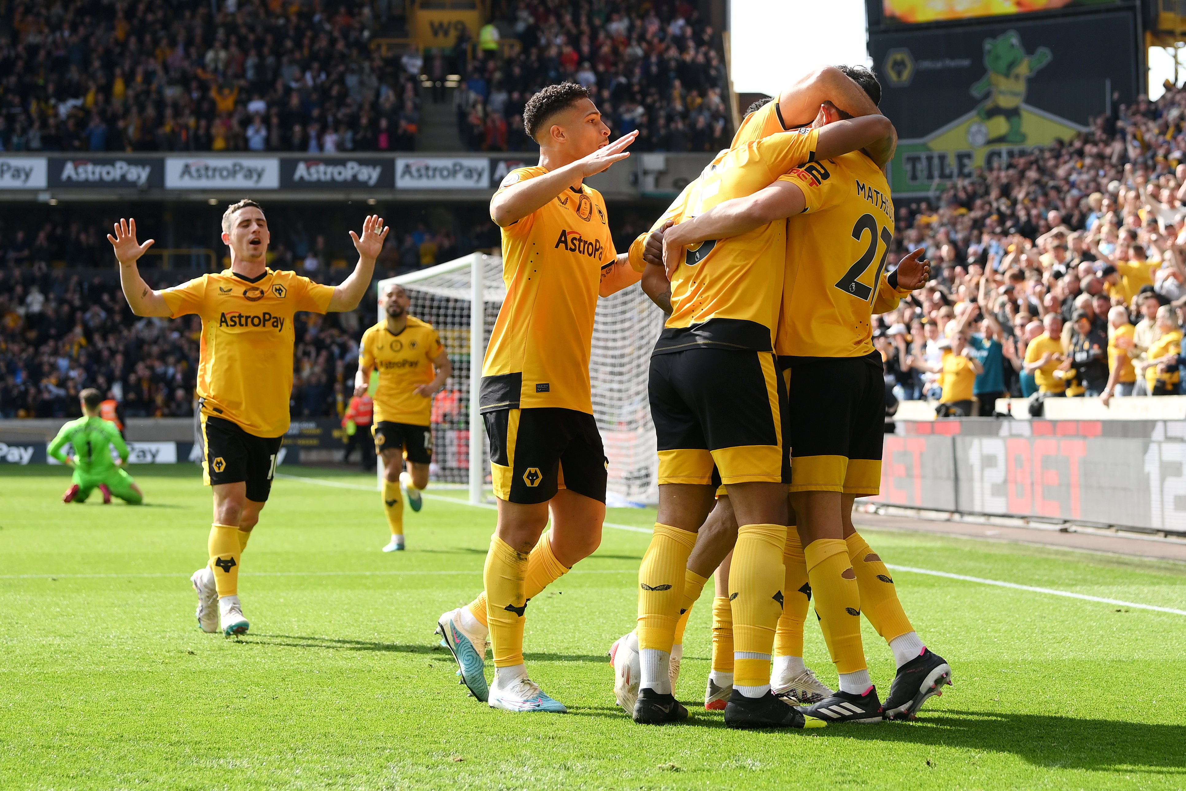 Matheus Nunes celebrates with teammates after scoring Wolves’ goal