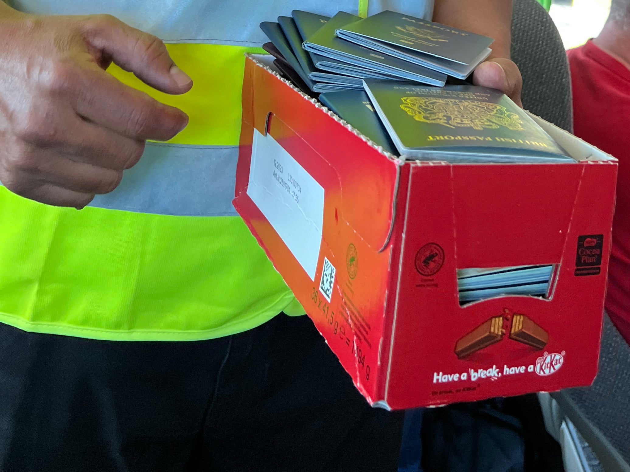 Papers please: Passports being collected by an international bus driver