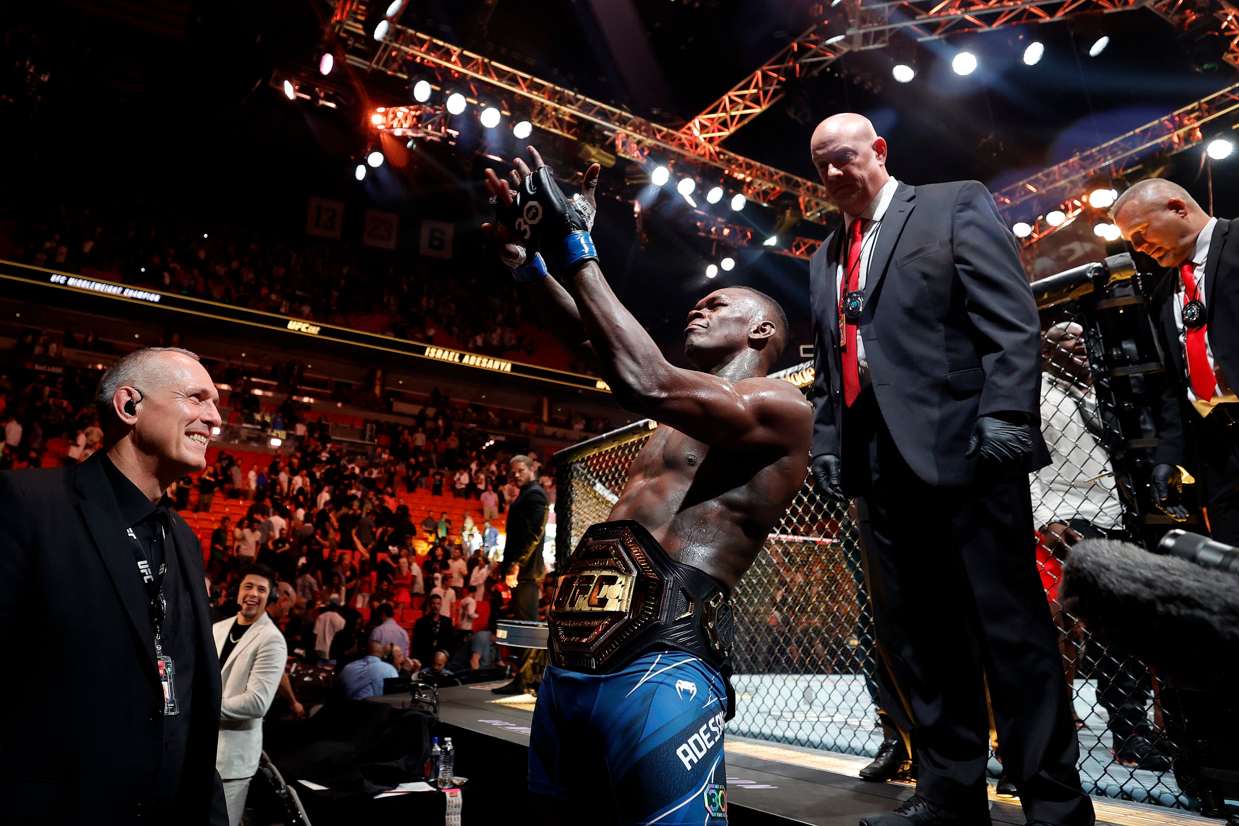 Israel Adesanya celebrates his victory over Alex Pereira at UFC 287