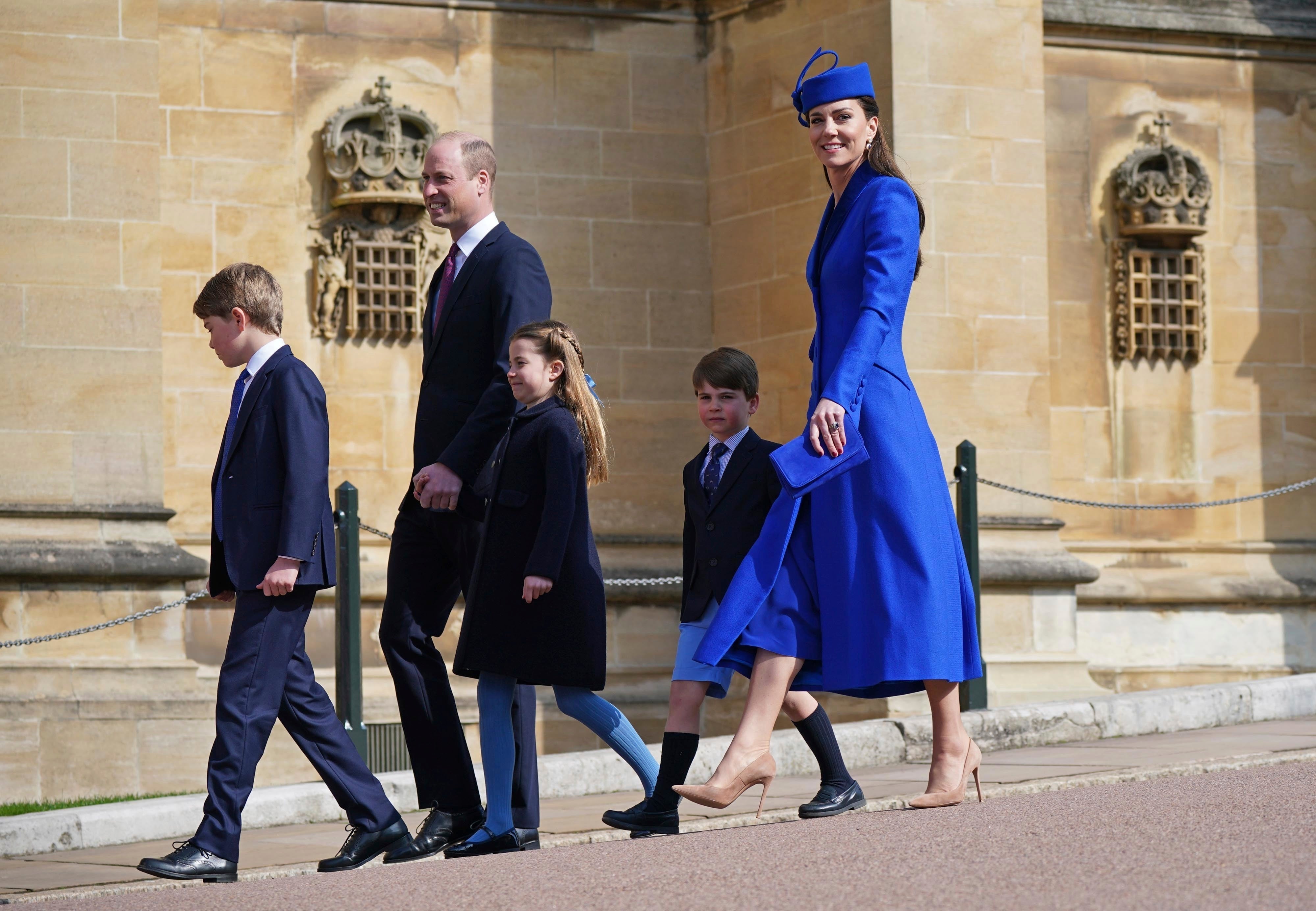 Prince William and Kate, Princess of Wales with their children Prince George, left, Princess Charlotte and Prince Louis