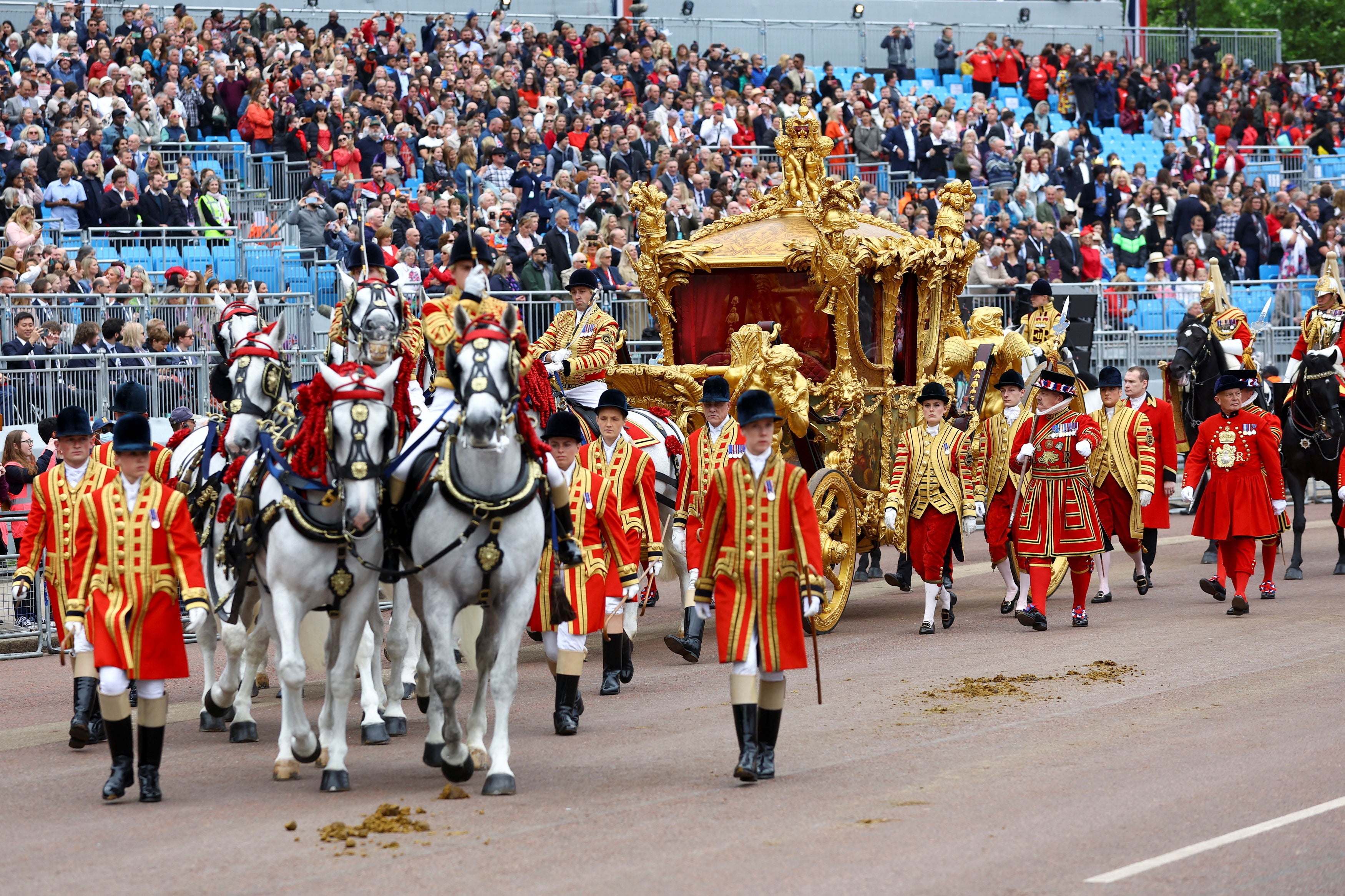 The Gold State Coach passes in front of Buckingham Palace during the Platinum Jubilee Pageant