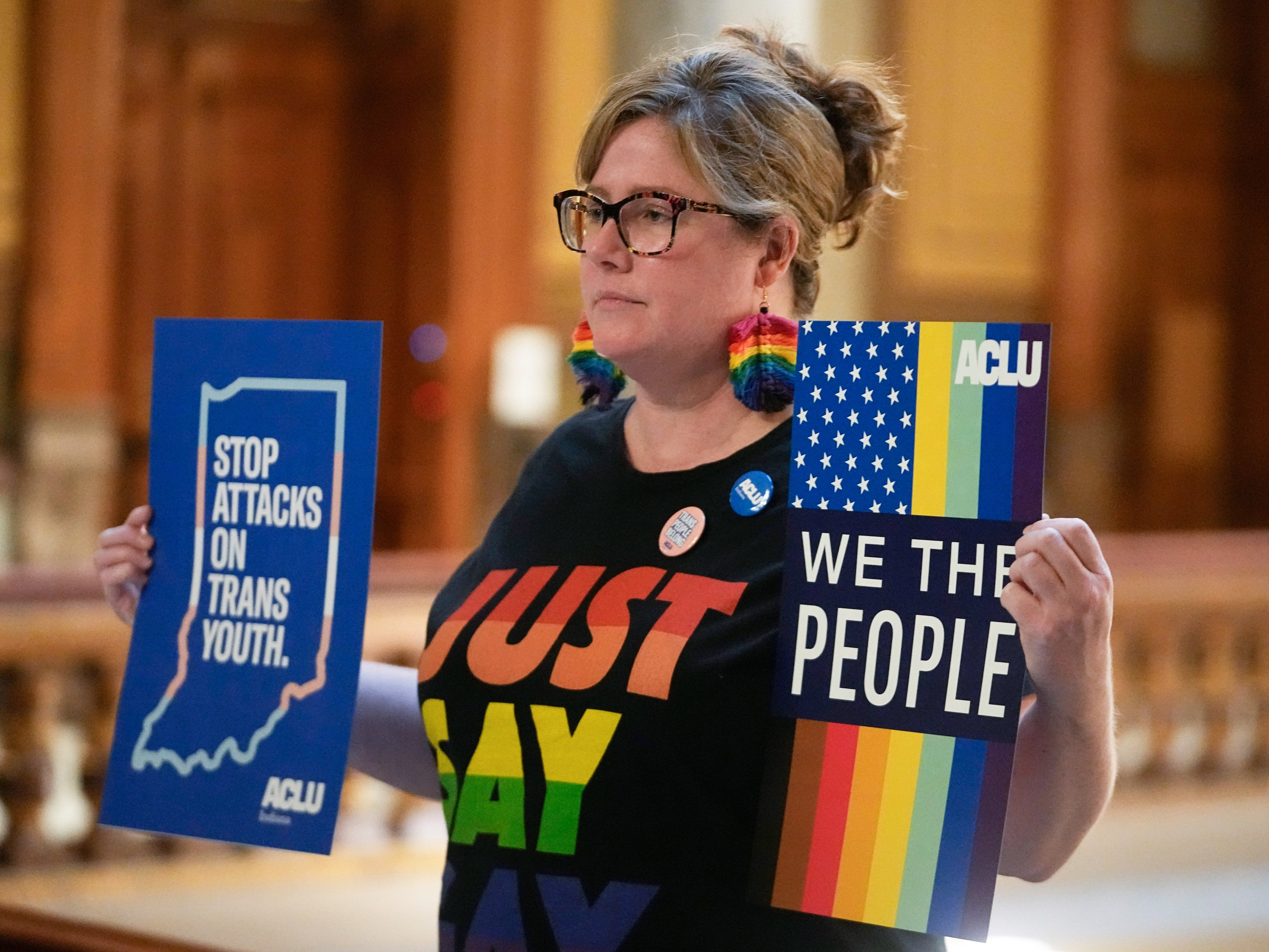 A trans rights protester outside the Indiana Statehouse on 22 February 2023