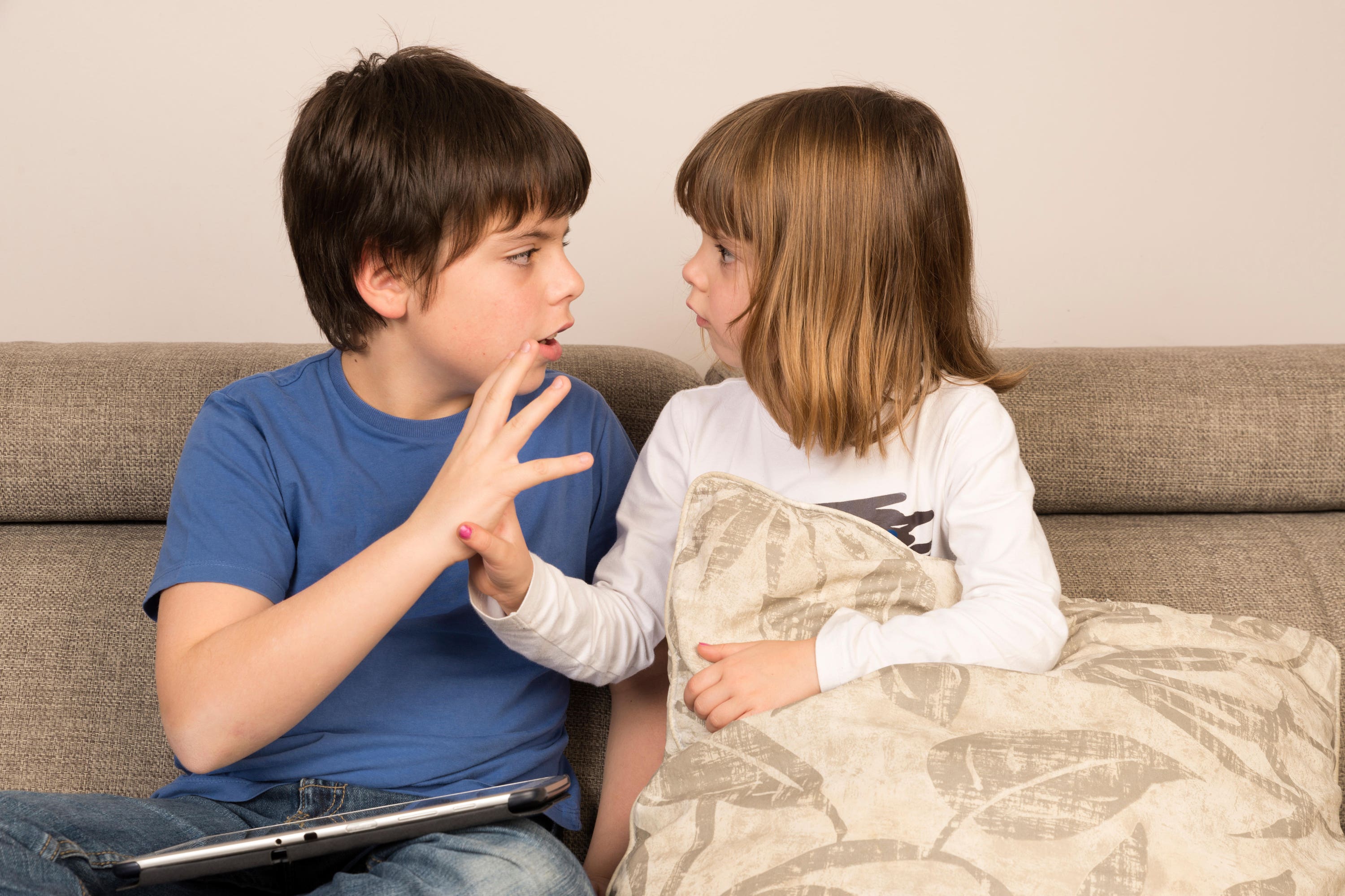 Parents can encourage sharing and keep rivalry at bay (Alamy/PA)