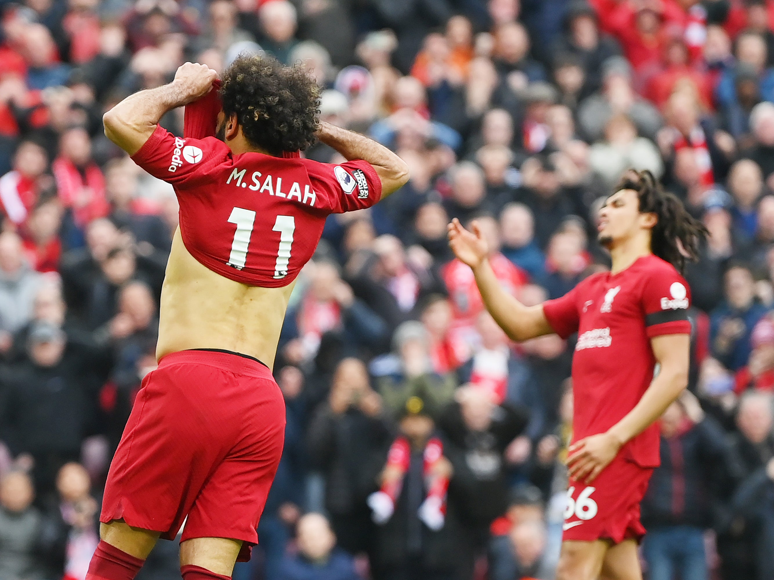 Mohamed Salah (left) missed a penalty as Liverpool came back from 2-0 down to draw with Arsenal