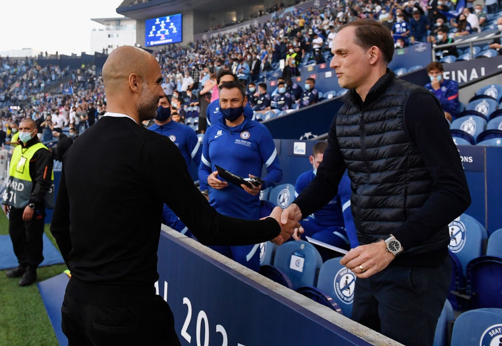 Friends for now: Pep Guardiola and Thomas Tuchel shake hands before the 2021 Champions League final in Porto