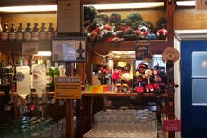 Police probe ‘racist’ Facebook posts by landlord displaying golly***s in pub