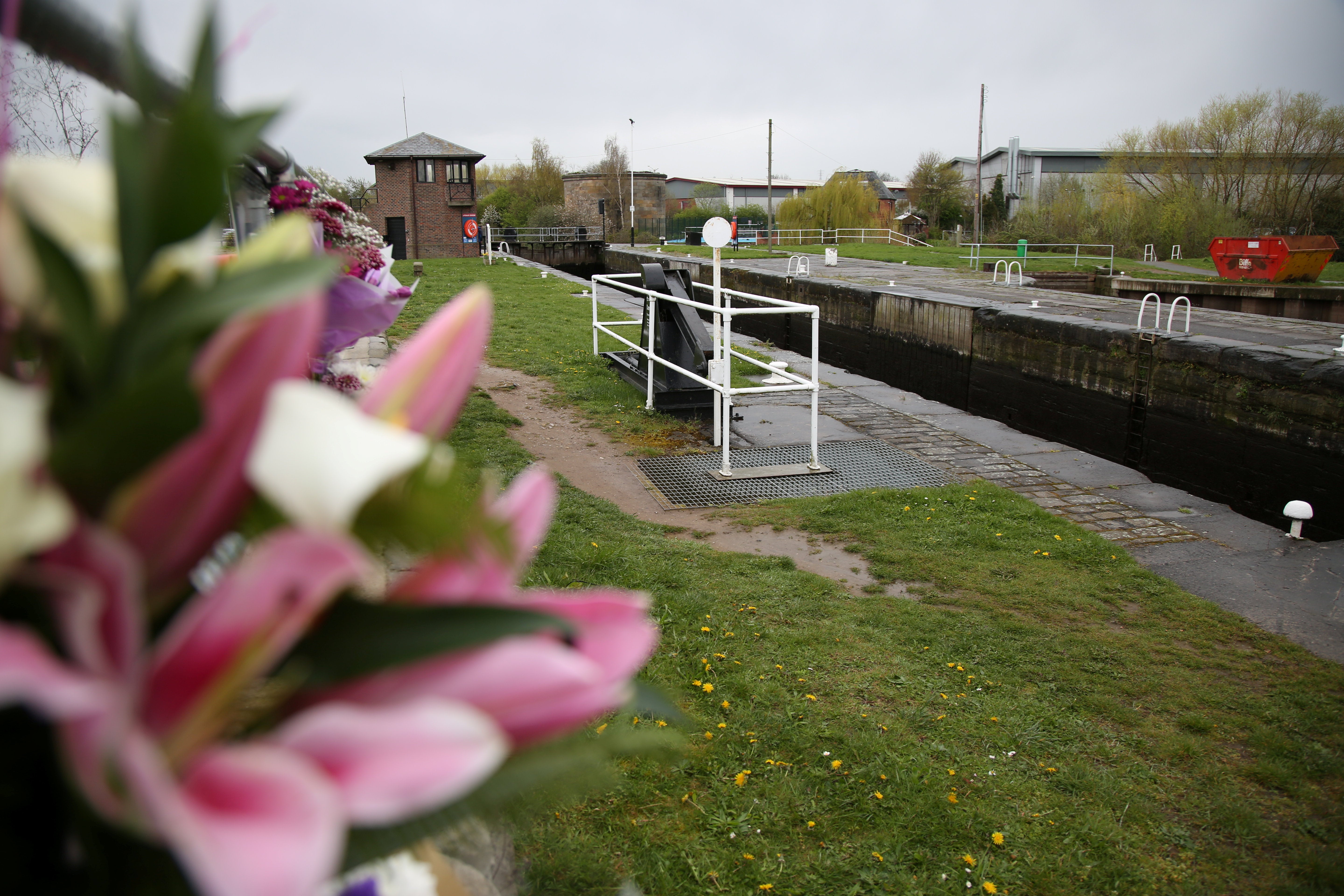 Cards and flowers have been left close to a rowing club and the city of Leeds sea cadets