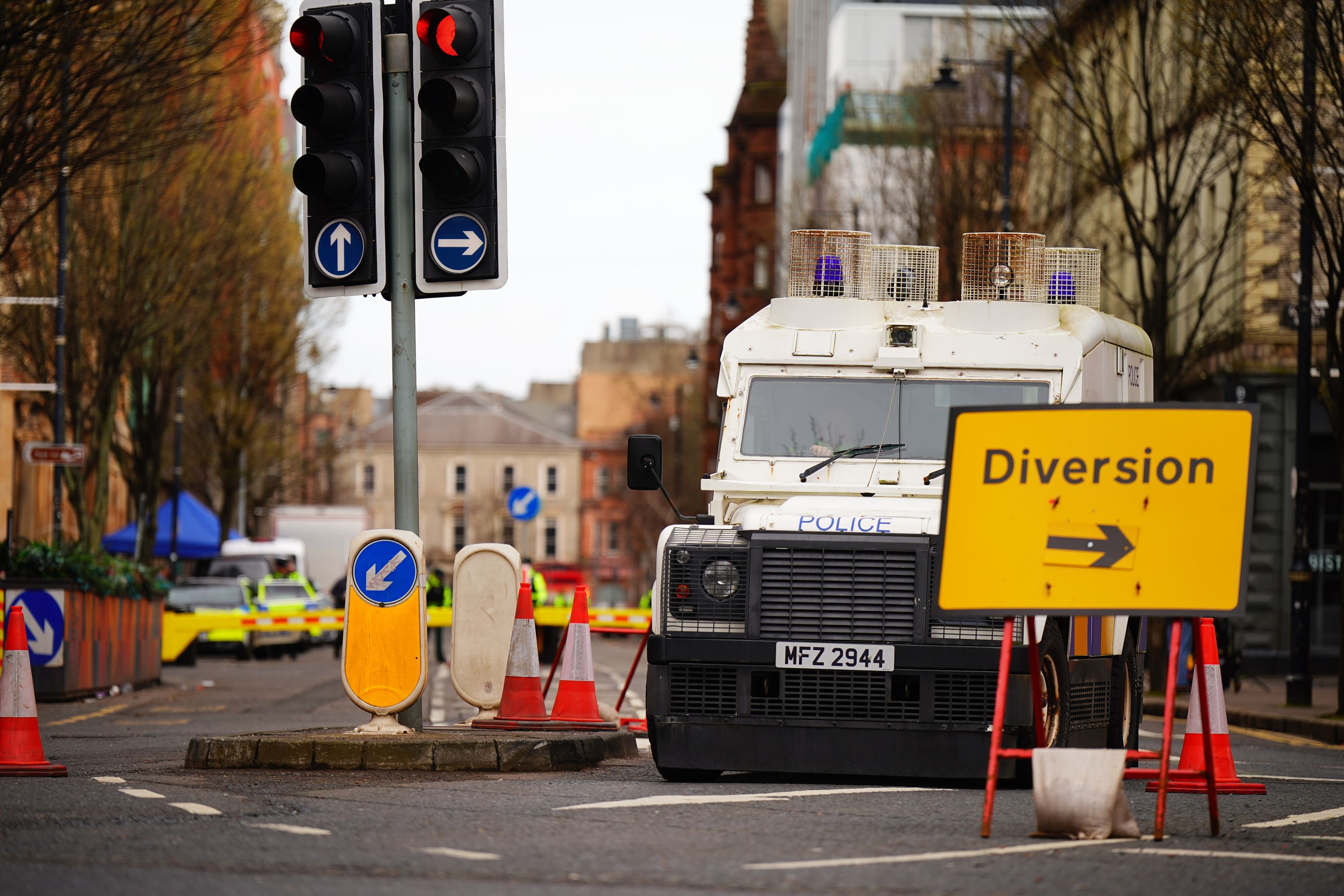 Dozens of police officers and secret service vehicles descended on Belfast on Tuesday morning in a major security operation ahead of US President Joe Biden’s visit (Aaron Chown/PA)