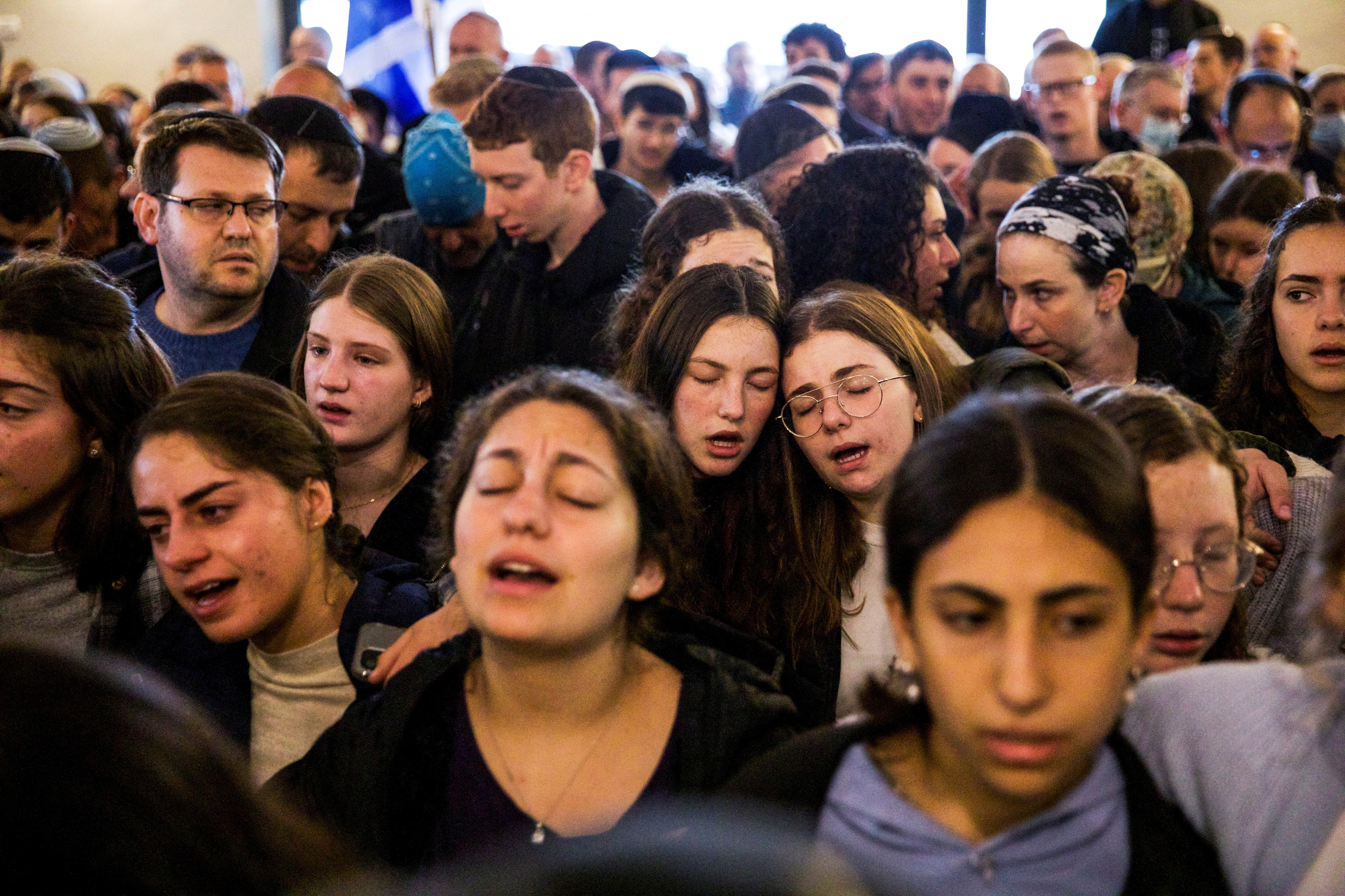 Friends and relatives mourn at her funeral in Kfar Etzion