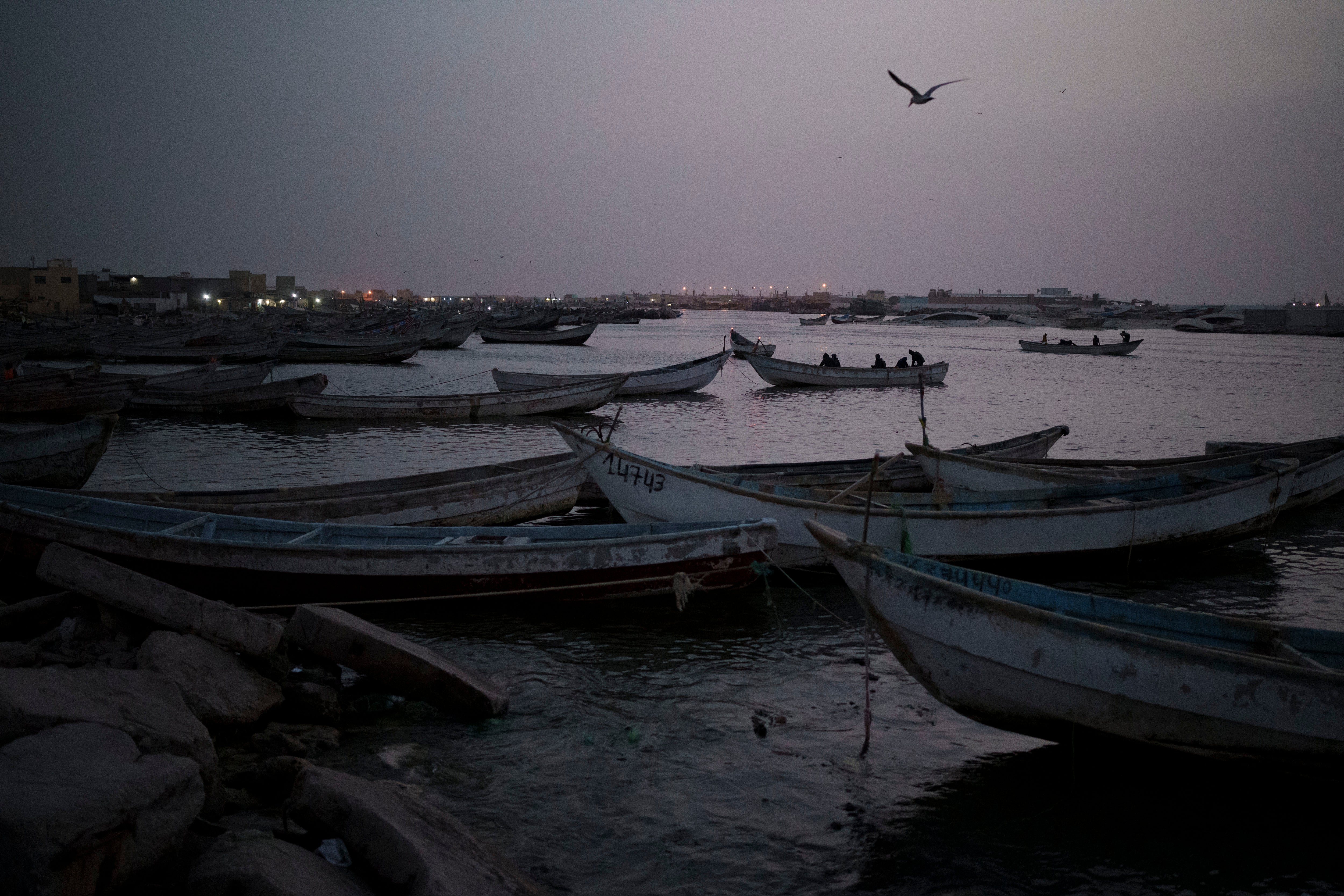 Pirogues, traditional fishing canoes, are often used by African migrants