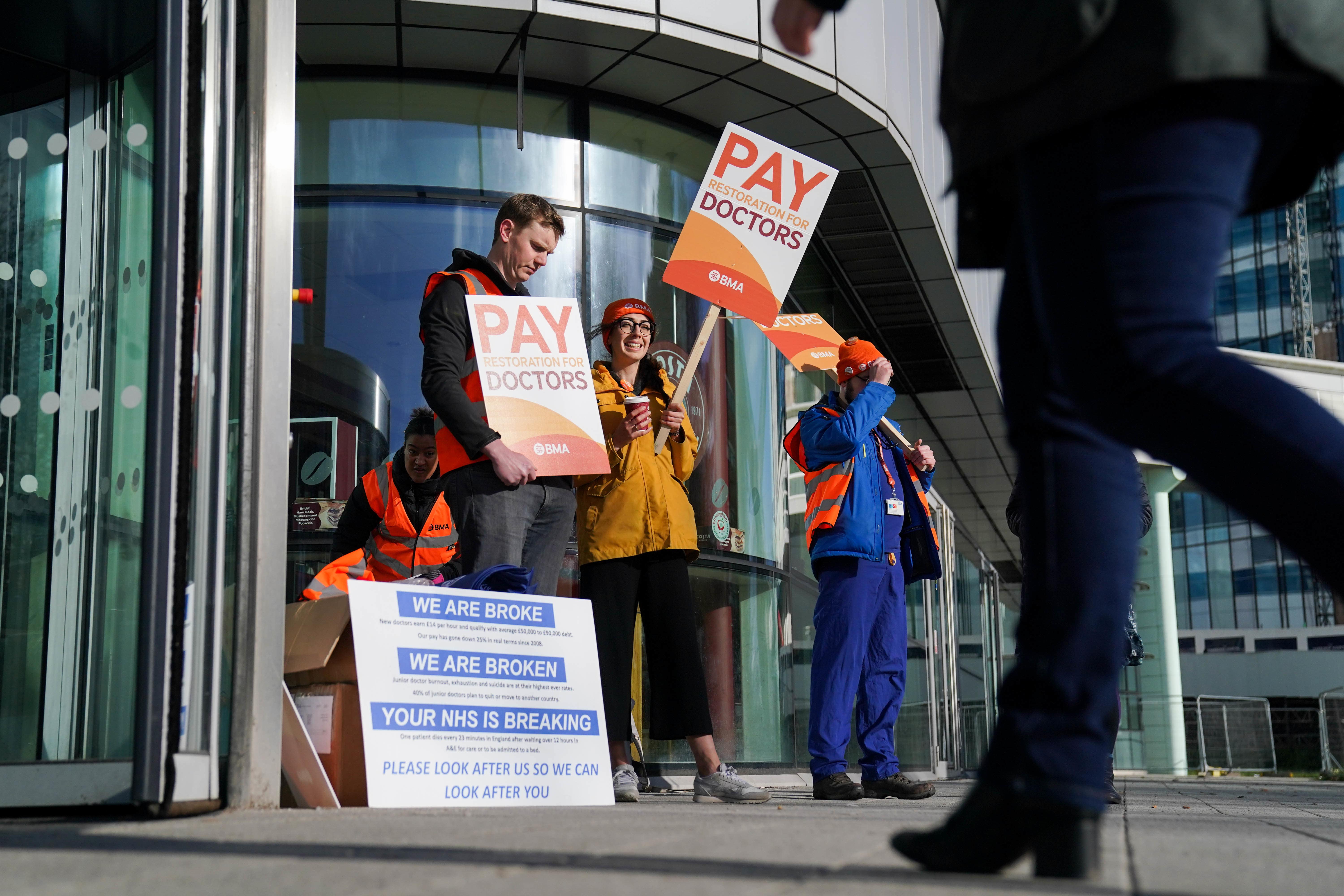 Striking NHS junior doctors on the picket line outside Queen Elizabeth hospital in Birmingham (Jacob King/PA)