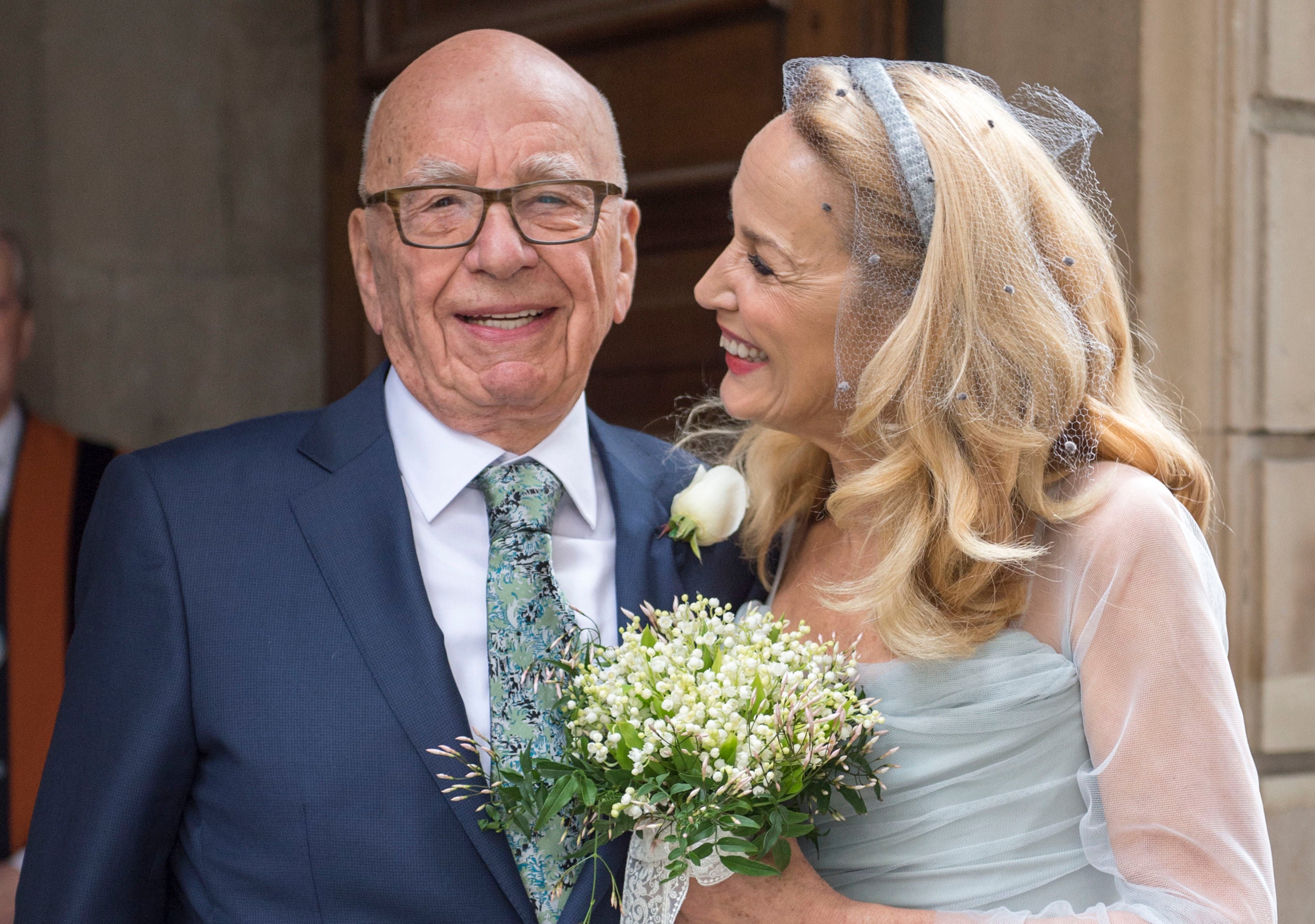 Murdoch and Hall at their wedding in March 2016