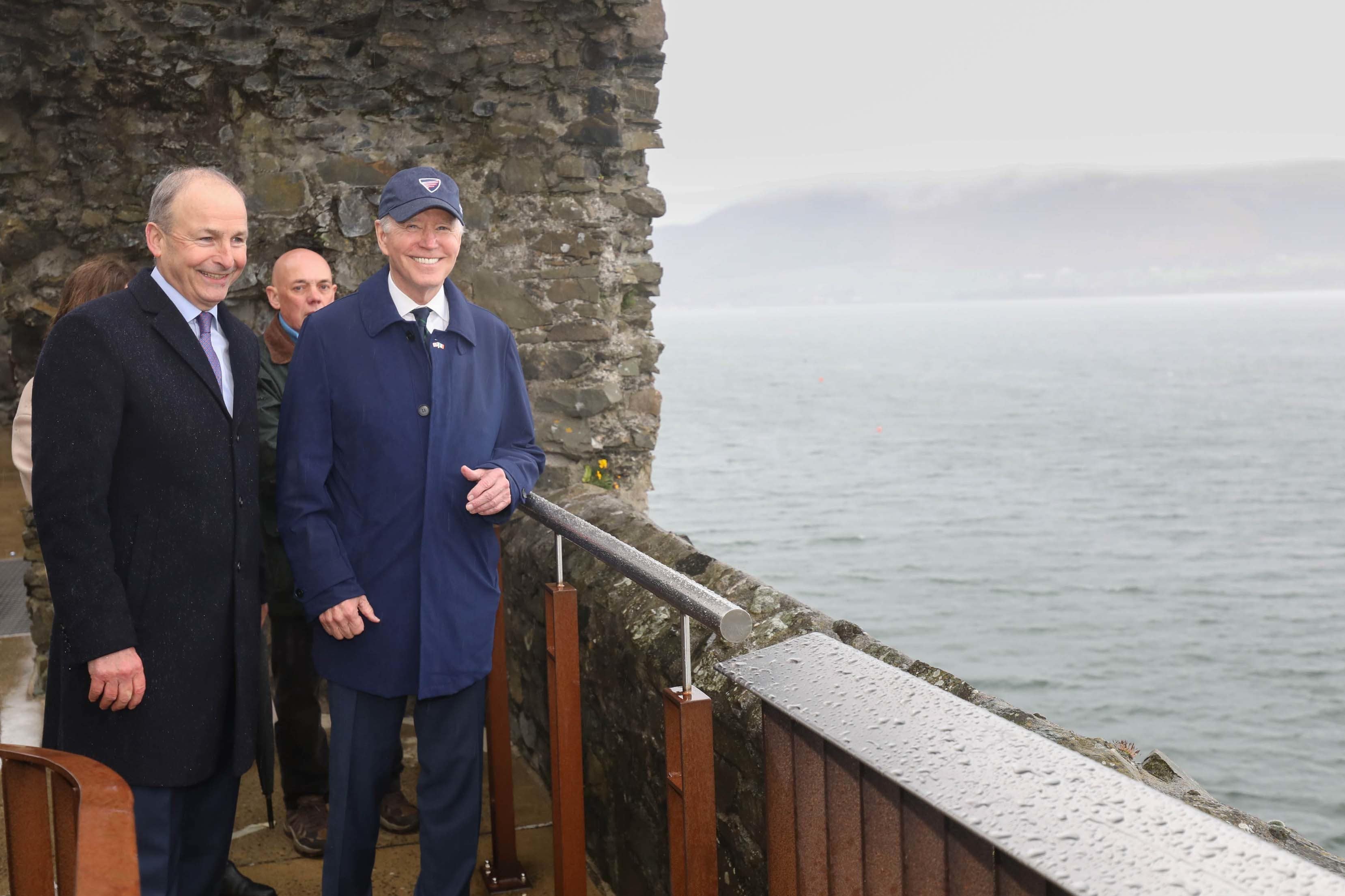 US President Joe Biden (right) with Tanaiste Micheal Martin at Carlingford Castle (Julien Behal/PA)