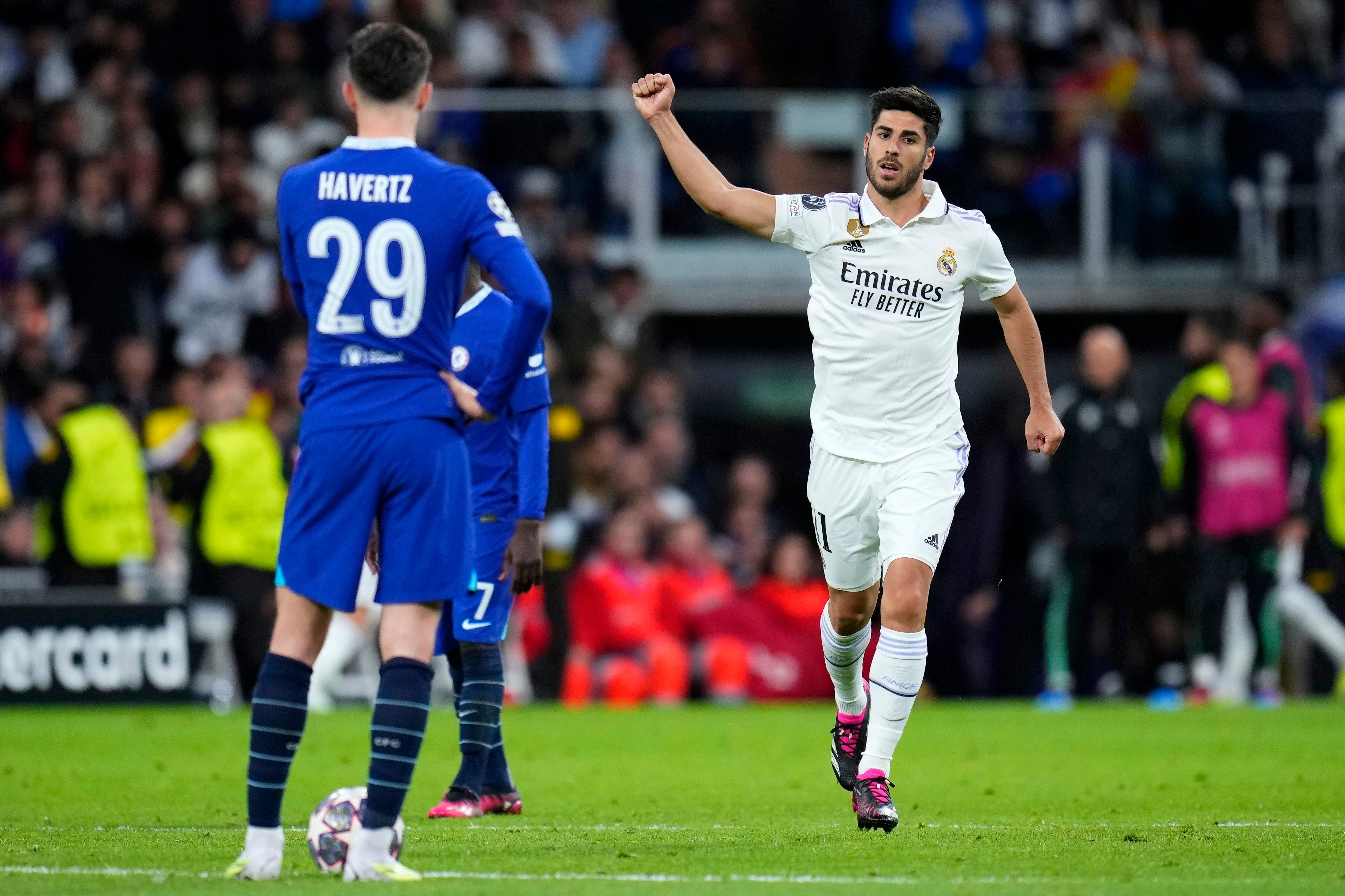 Marco Asensio celebrates scoring Madrid’s second goal as Kai Havertz looks on