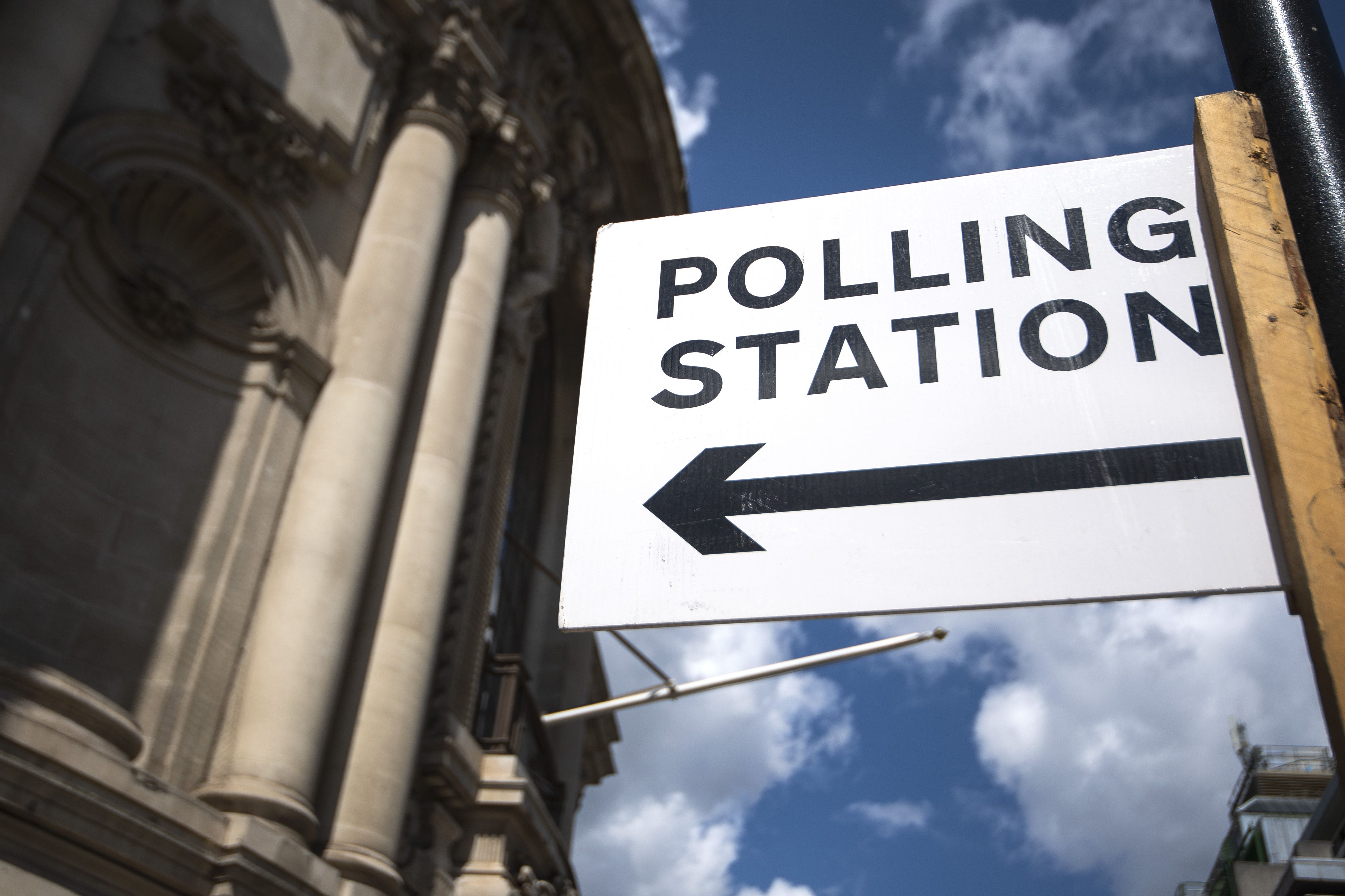 Signage outside a polling station in central Westminster, London. Local elections are taking place across England, as well as parliamentary elections in Scotland and Wales, on Thursday. Picture date: Wednesday May 5, 2021.