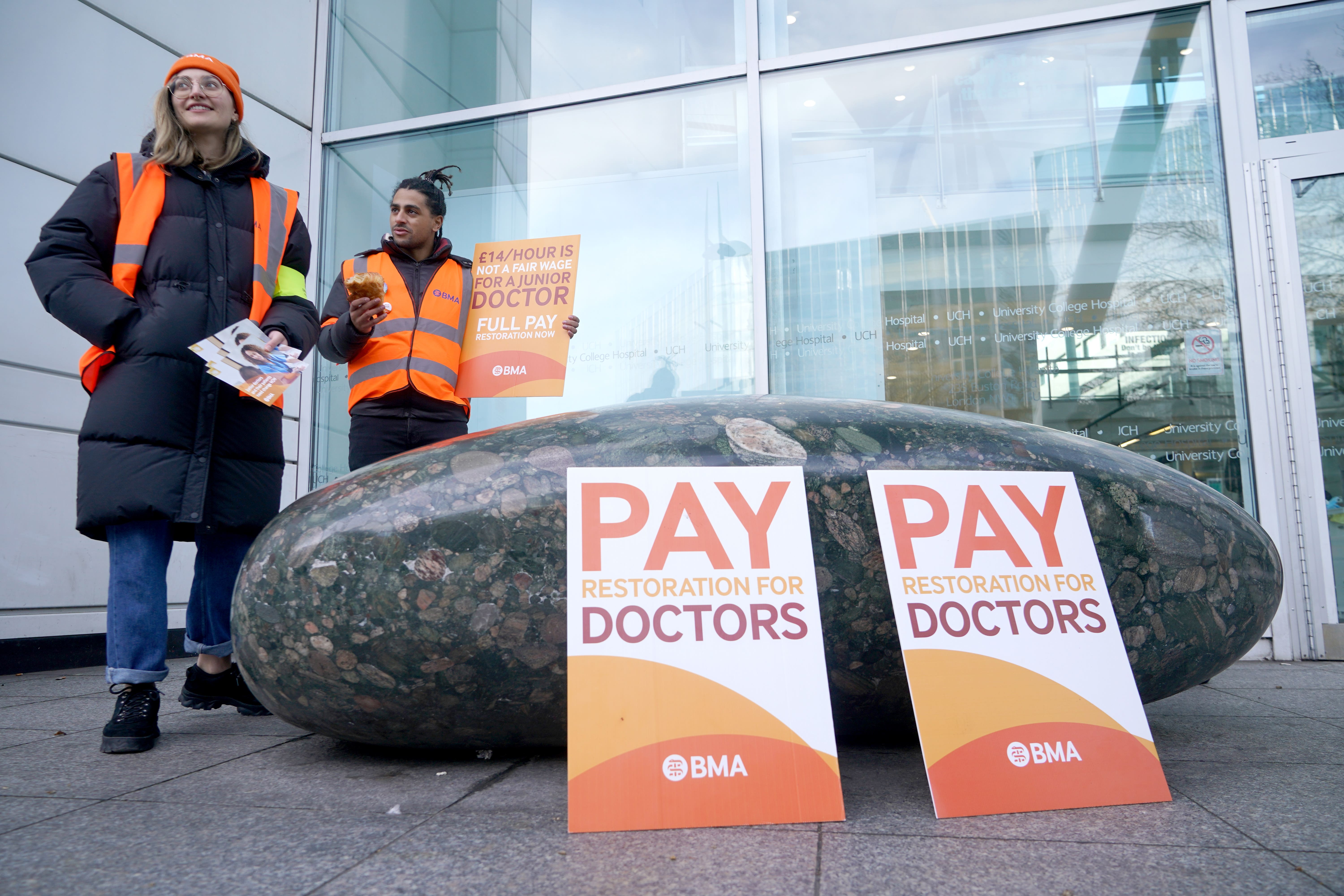 Striking NHS junior doctors on the picket line outside the University College Hospital in London (PA)