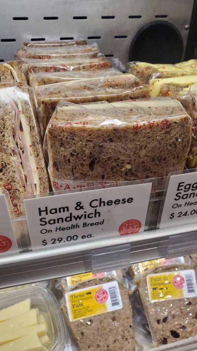 The pre-packed ham and cheese sandwich on “health” bread costs $29