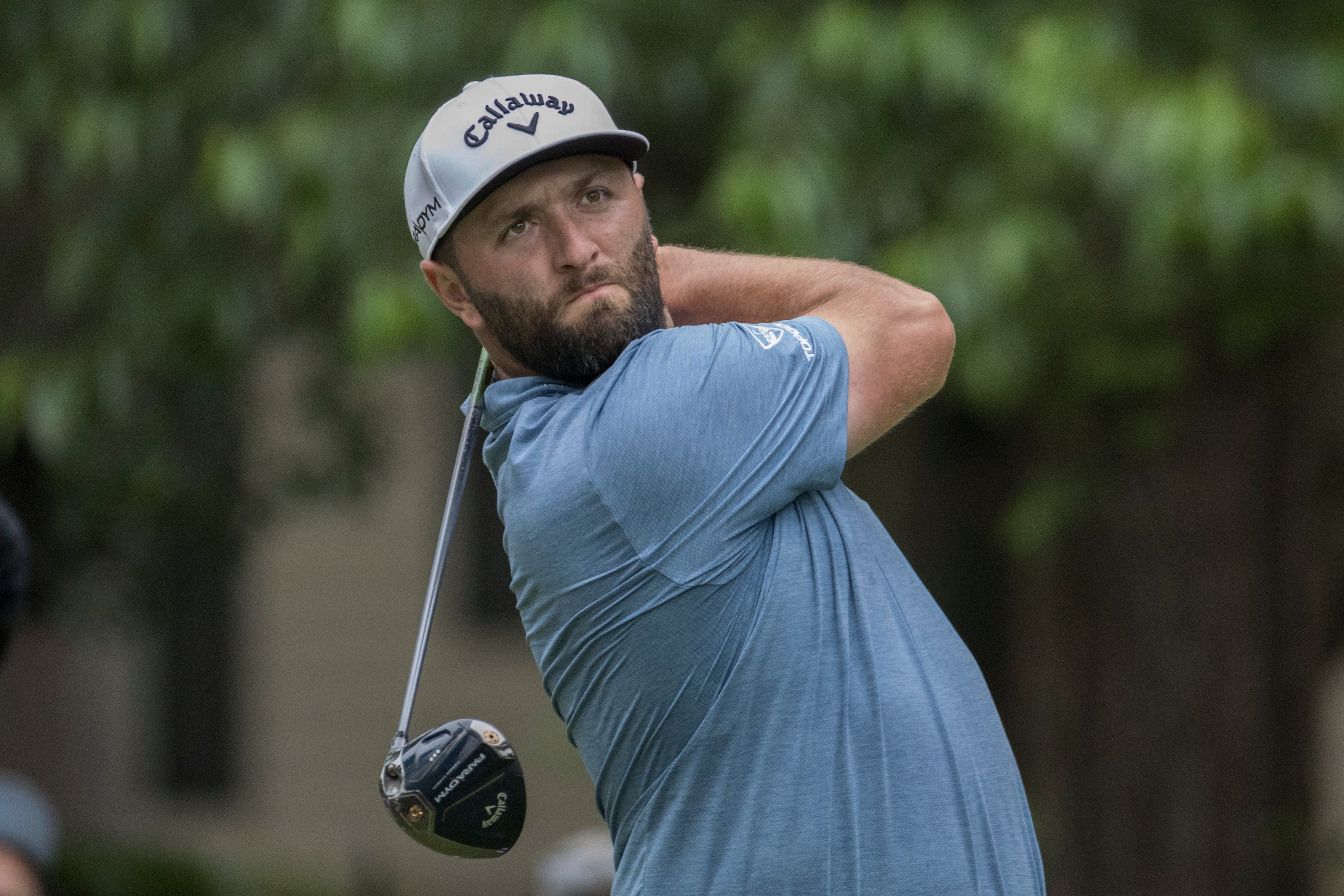 Jon Rahm, of Spain, watches his drive down the 12th fairway (Stephen B Morton/AP)