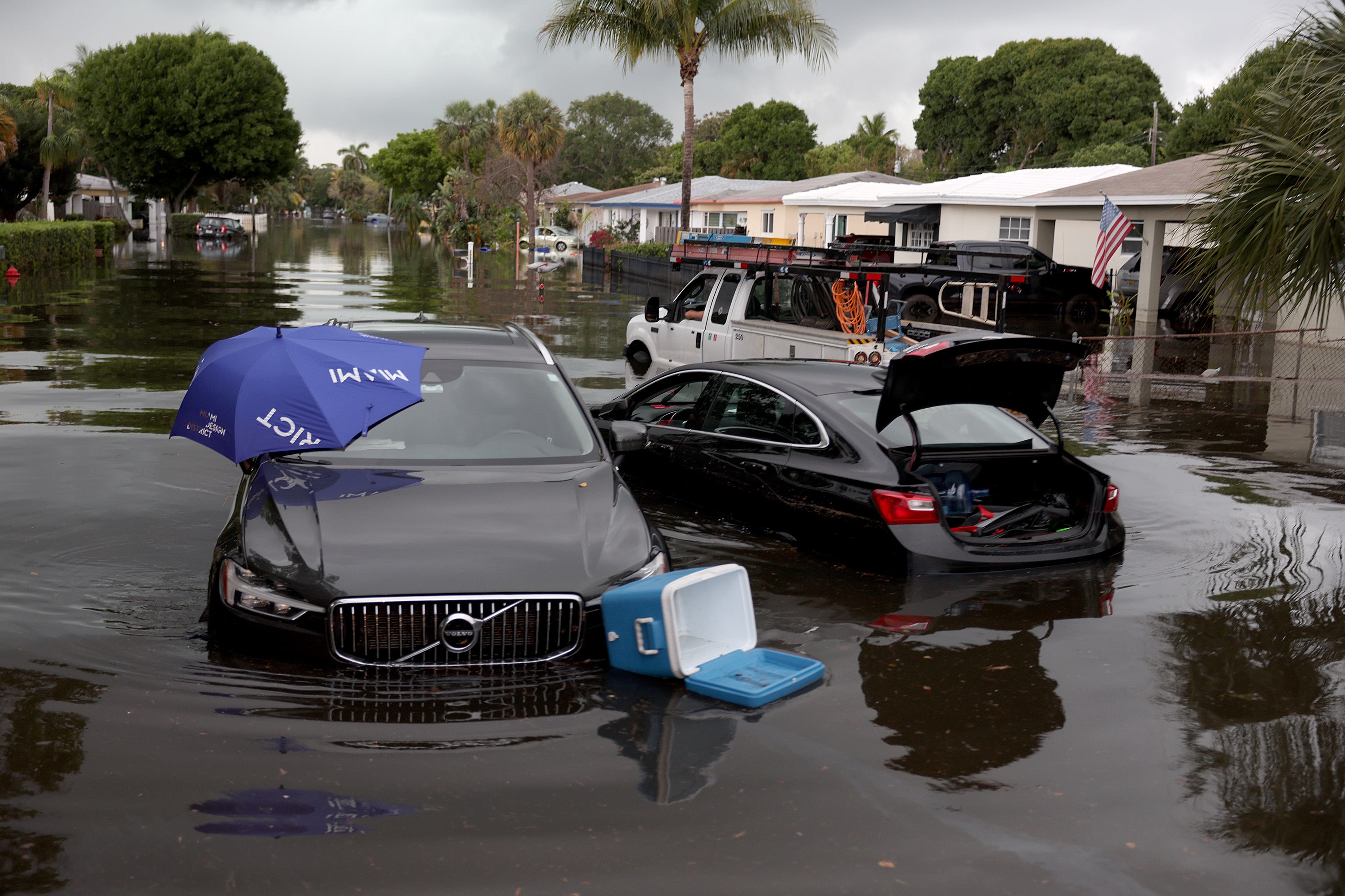 Abandoned vehicles sit in a flooded street on April 13, 2023 in Fort Lauderdale, Florida. Nearly 26 inches of rain fell on Fort Lauderdale over a 24-hour period