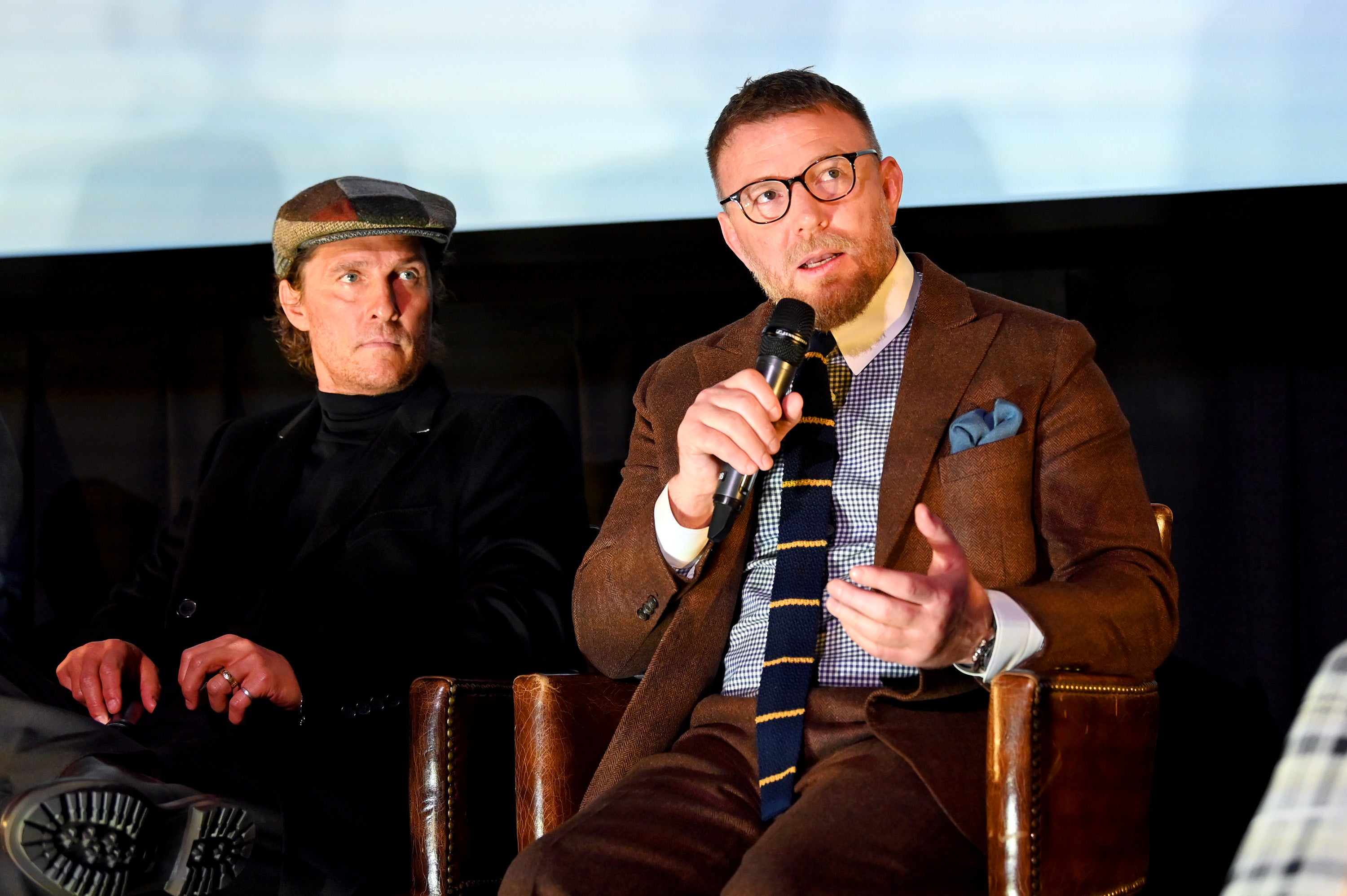 Matthew McConaughey and Guy Ritchie speak onstage during the Special NY Screening of ‘The Gentlemen'