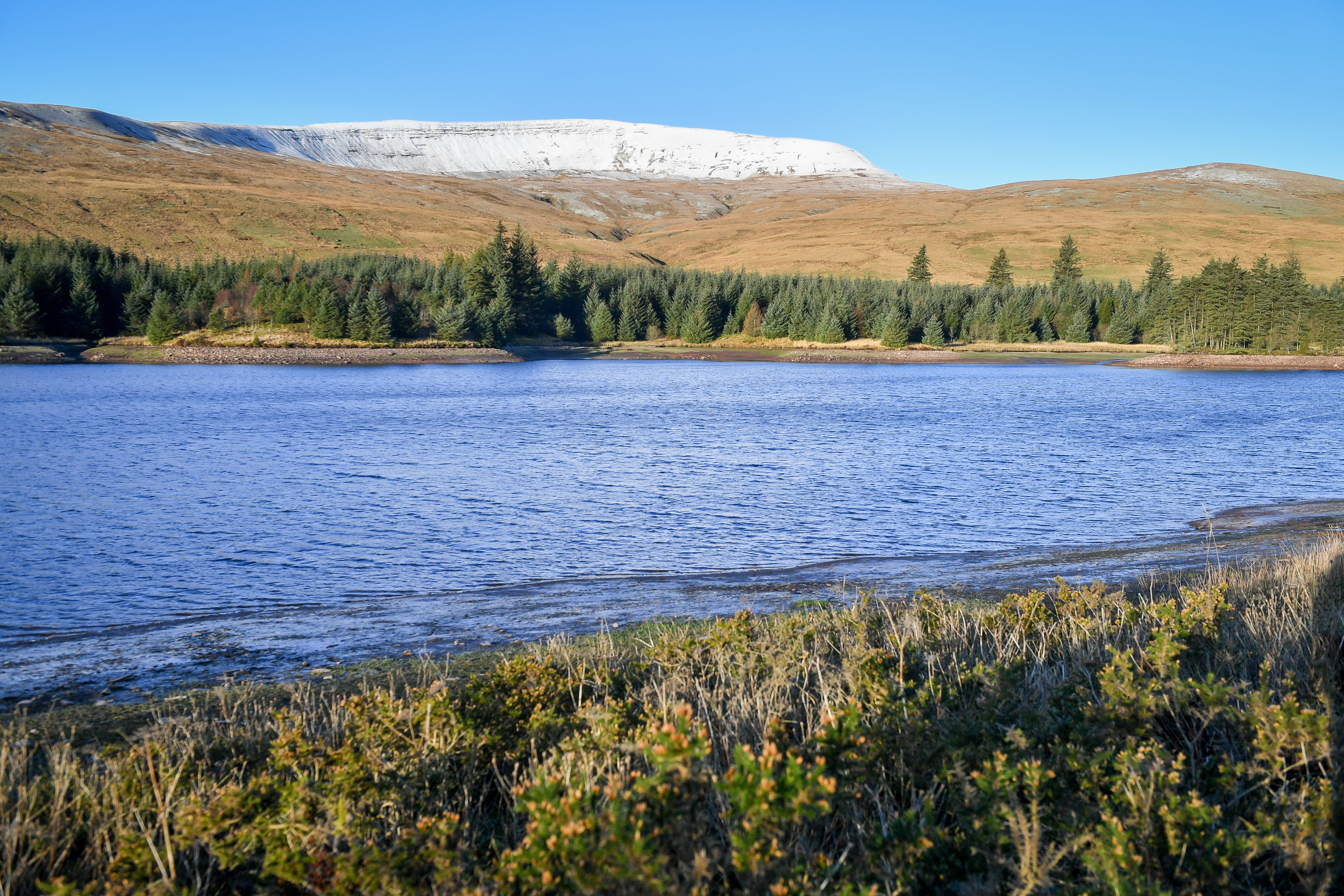 Snow and frost settle on the peaks of the hills in the now-renamed Bannau Brycheiniog National Park (Ben Birchall/PA)