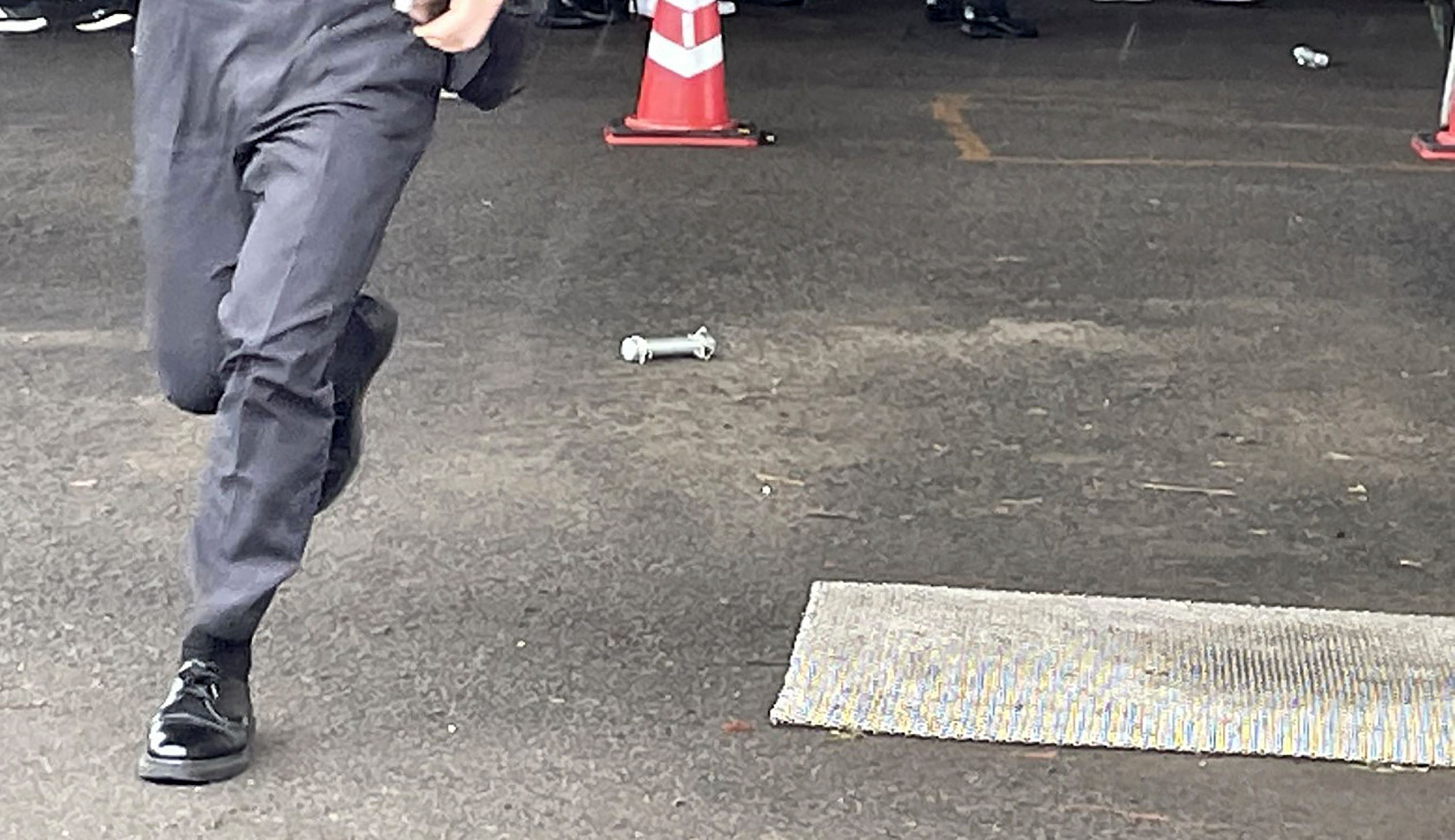 A cylinder-shaped object believed to have been thrown during prime minister Fumio Kishida’s campaign speech