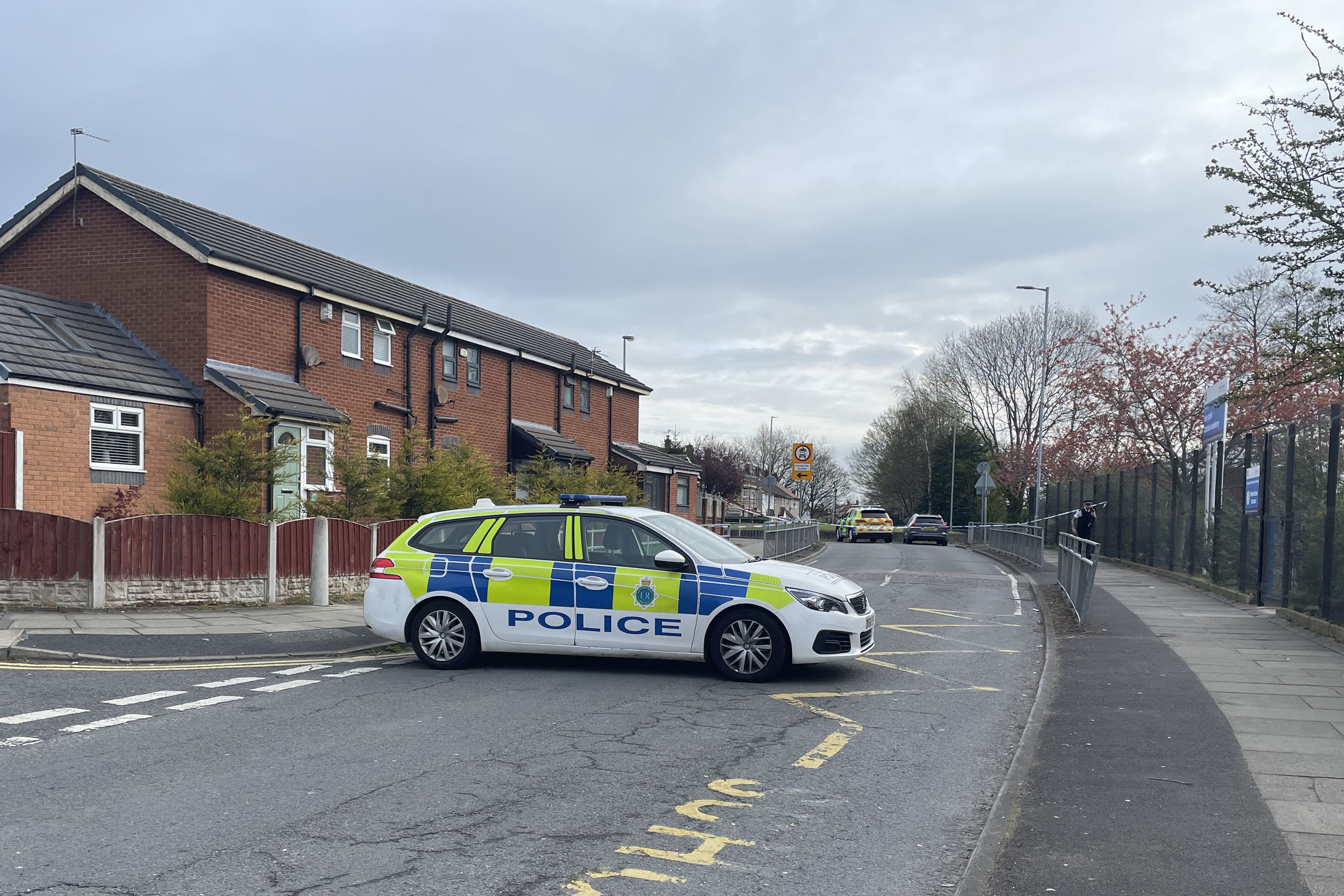 Police at the scene in Netherton, Merseyside, after a man was hit by a suspected stolen car. The man, in his 60s, was hit by a dark BMW which then ploughed into the garden on Morgan Mews in the Netherton area of Liverpool at about 9.05pm on Thursday. The driver of the car, which was suspected to have been stolen during a previous burglary, fled the scene on foot, police said. Picture date: Friday April 14, 2023.