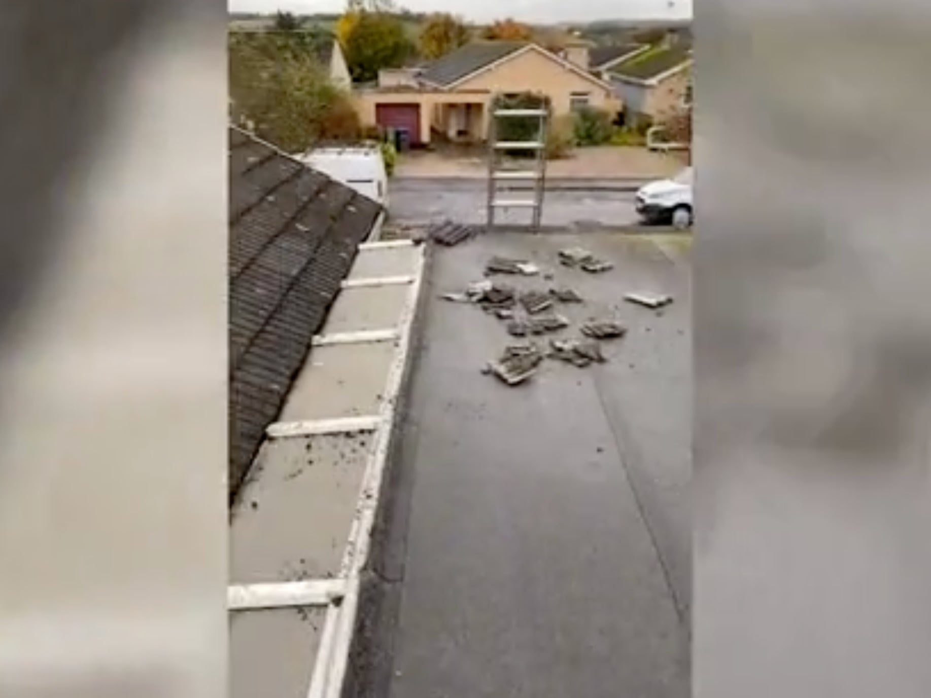 The workmen film their “repairs” to Mr Bray’s roof