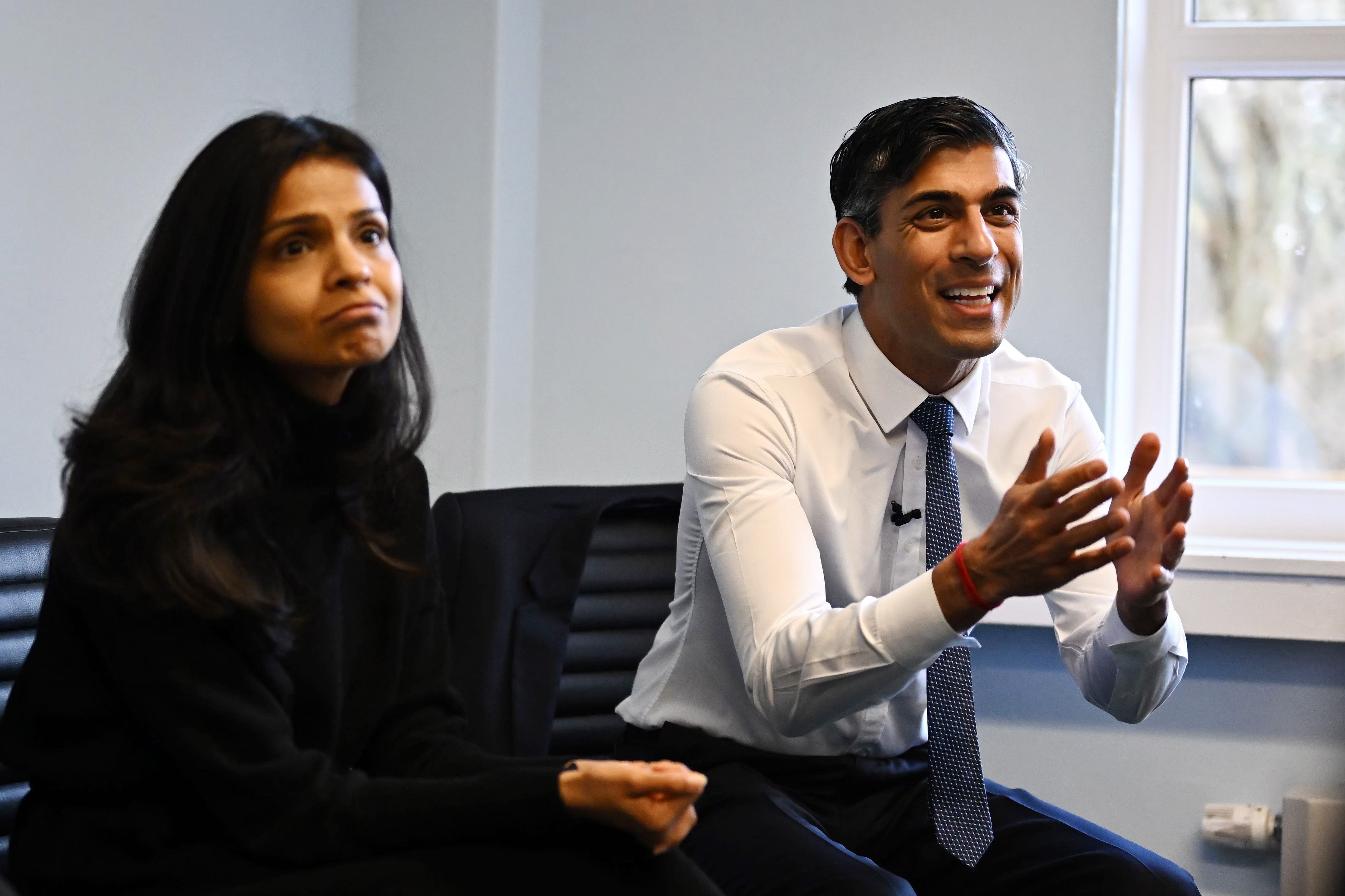 Rishi Sunak with his wife at childcare hub